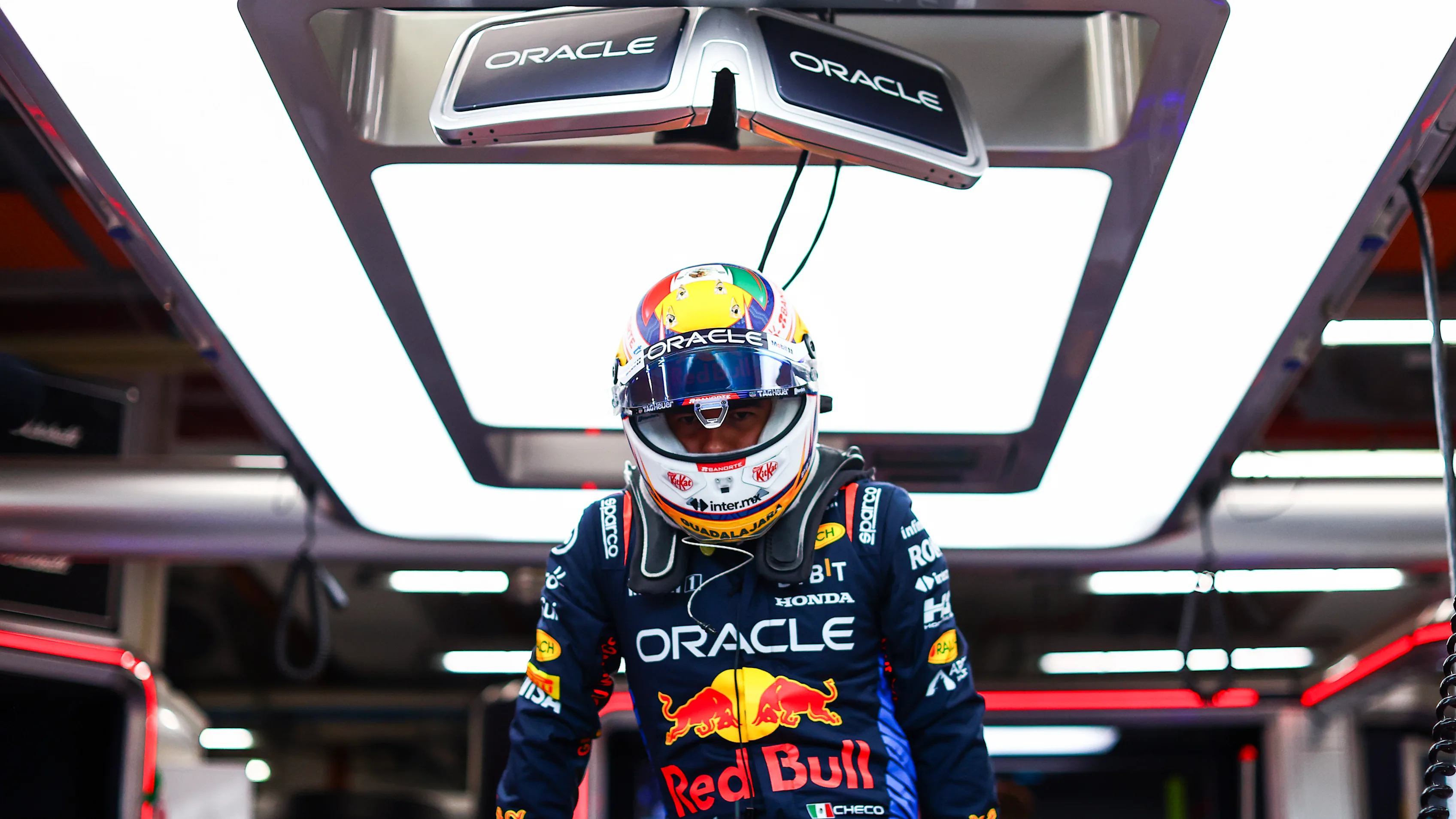 SINGAPORE, SINGAPORE - SEPTEMBER 21: Sergio Perez of Mexico and Oracle Red Bull Racing prepares to