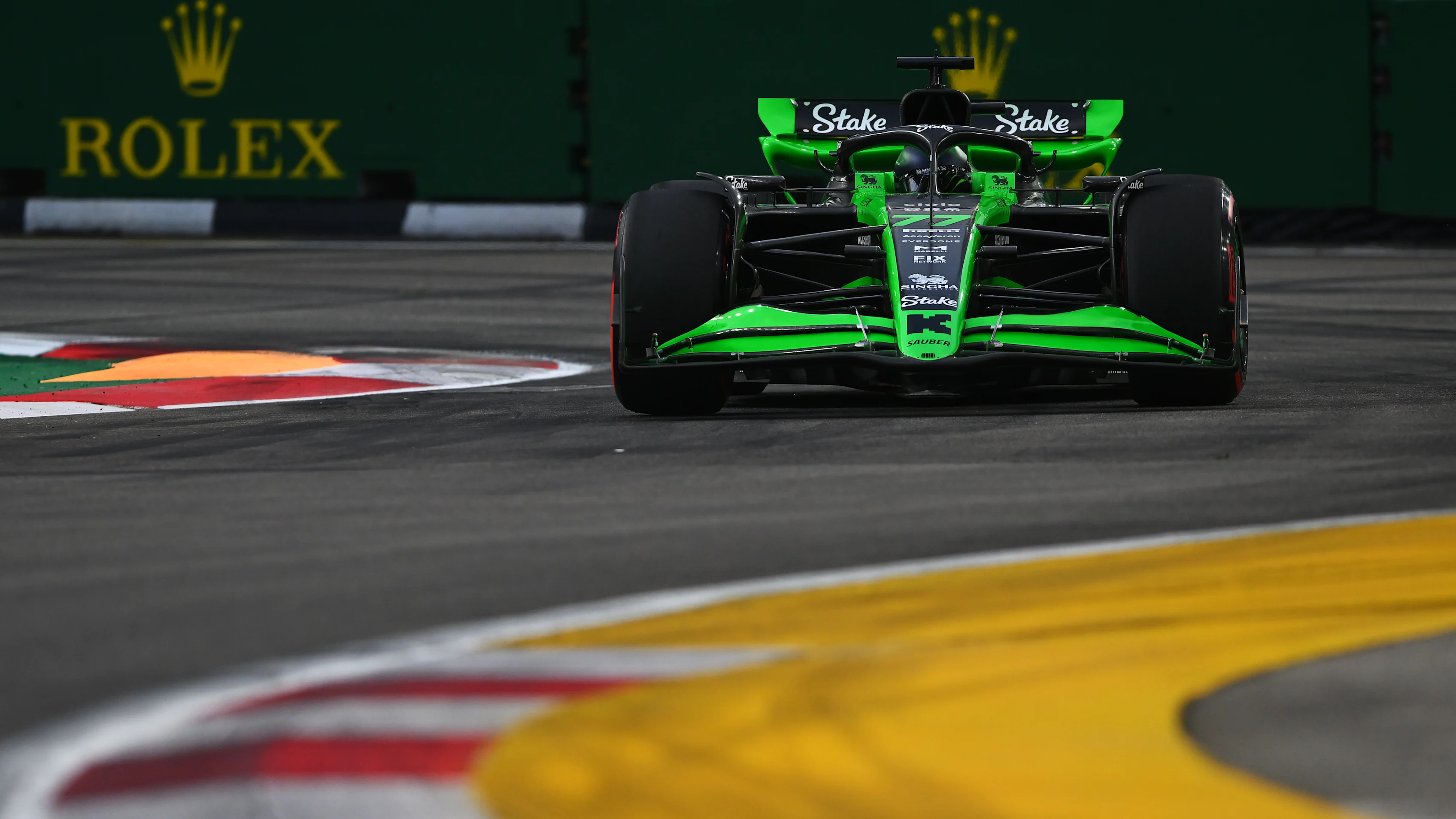 SINGAPORE, SINGAPORE - SEPTEMBER 21: Valtteri Bottas of Finland driving the (77) Kick Sauber C44