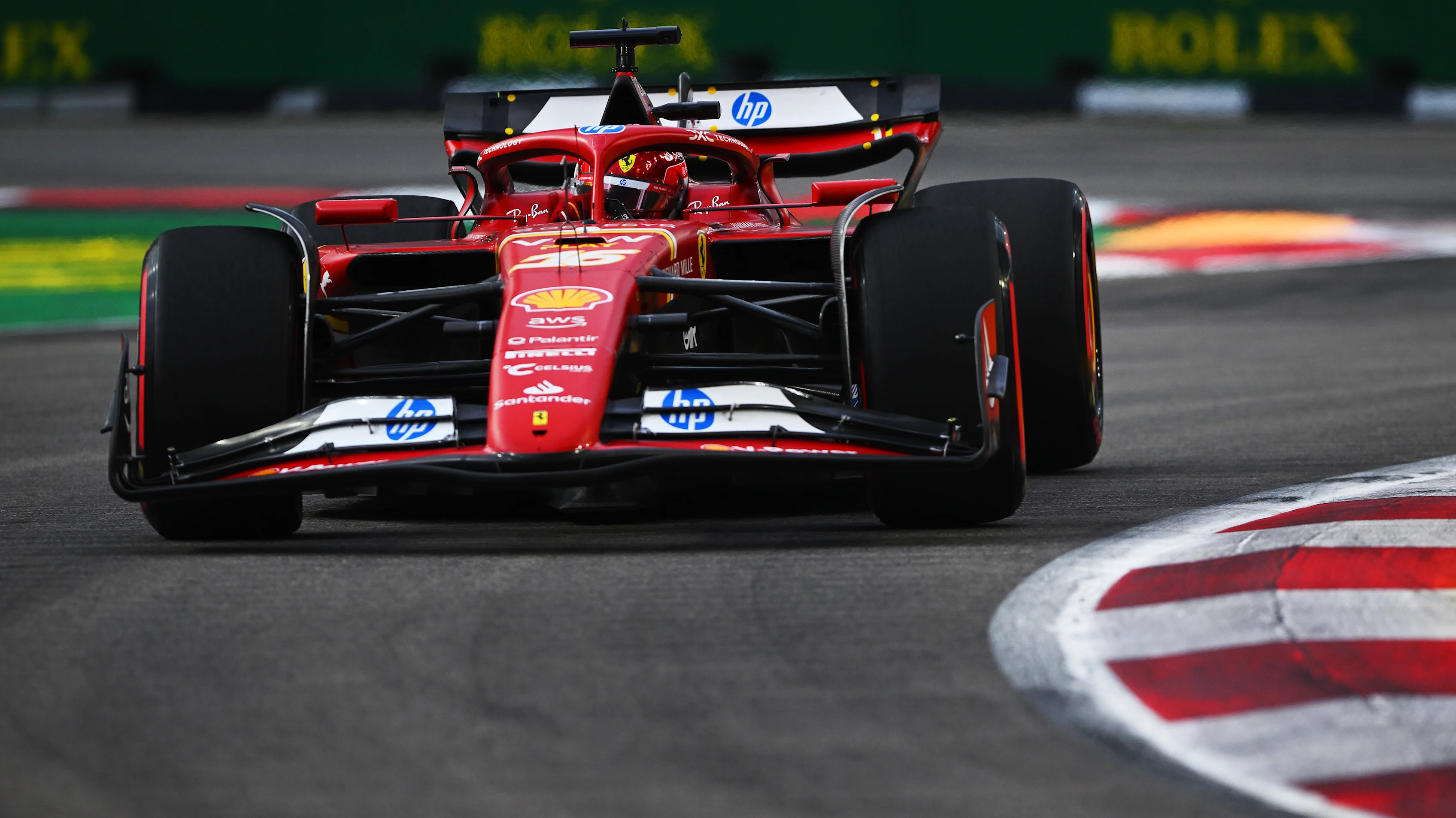 SINGAPORE, SINGAPORE - SEPTEMBER 21: Charles Leclerc of Monaco driving the (16) Ferrari SF-24 on