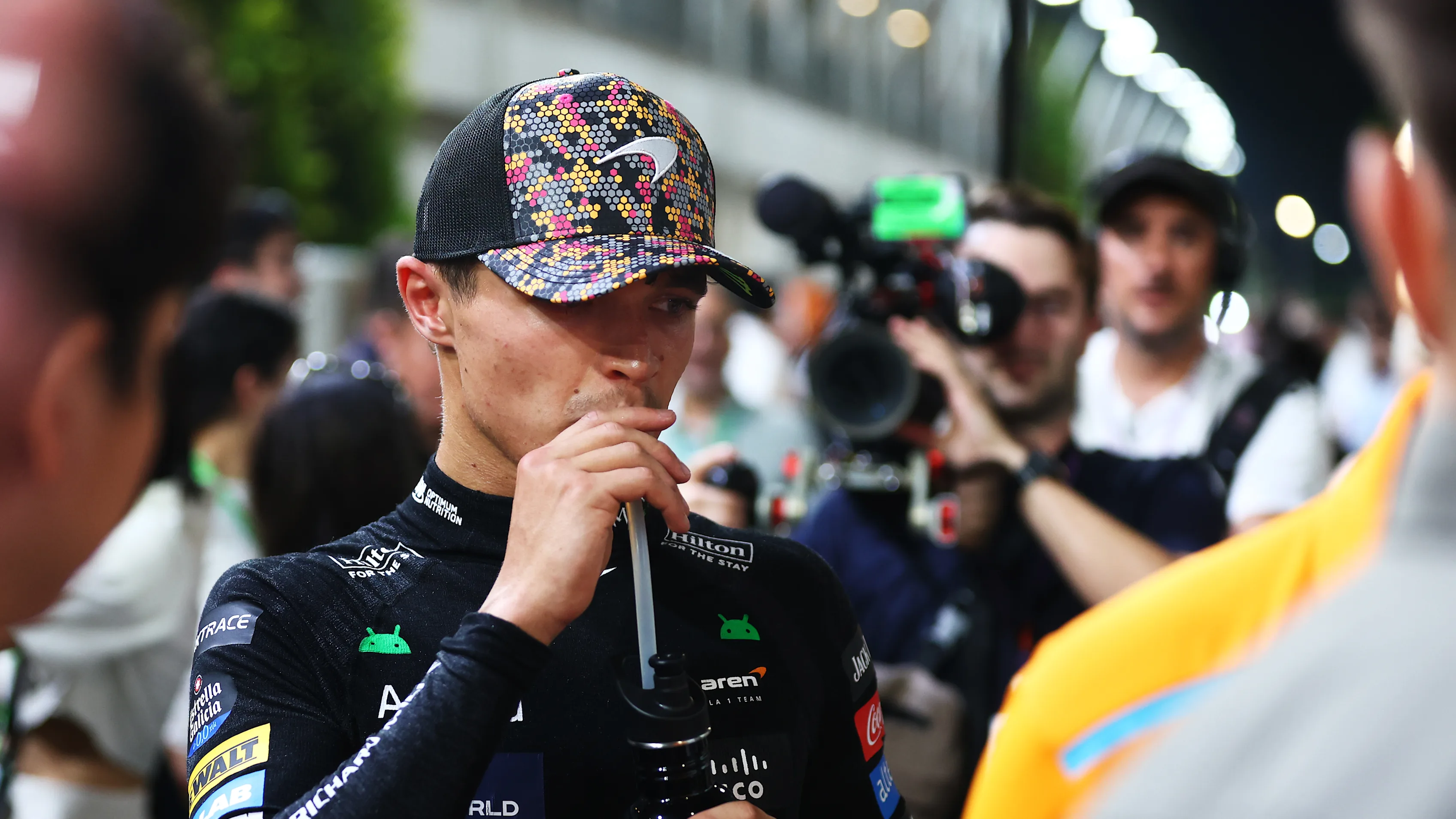 SINGAPORE, SINGAPORE - SEPTEMBER 21: Pole position qualifier Lando Norris of Great Britain and
