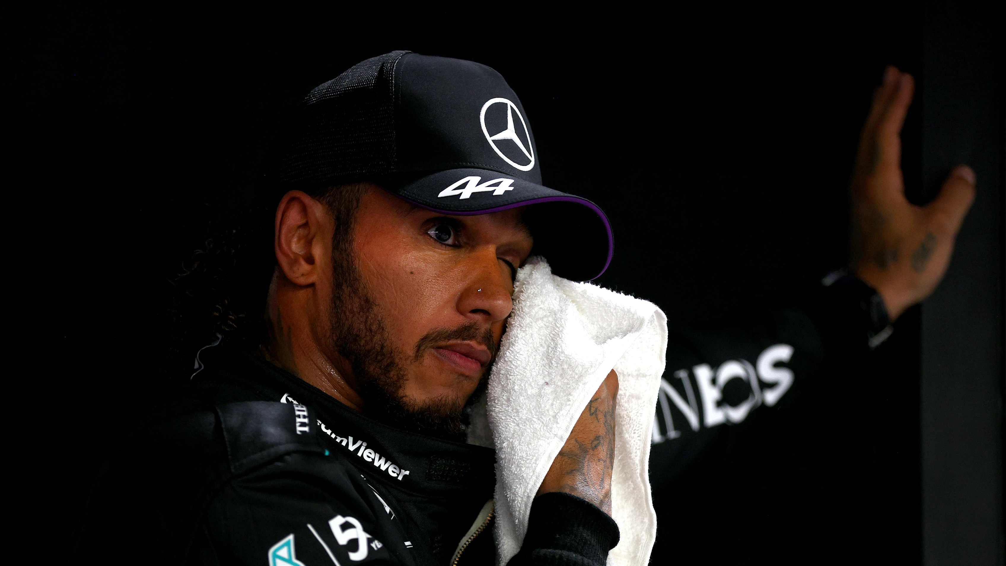 SINGAPORE, SINGAPORE - SEPTEMBER 21: Third placed qualifier Lewis Hamilton of Great Britain and