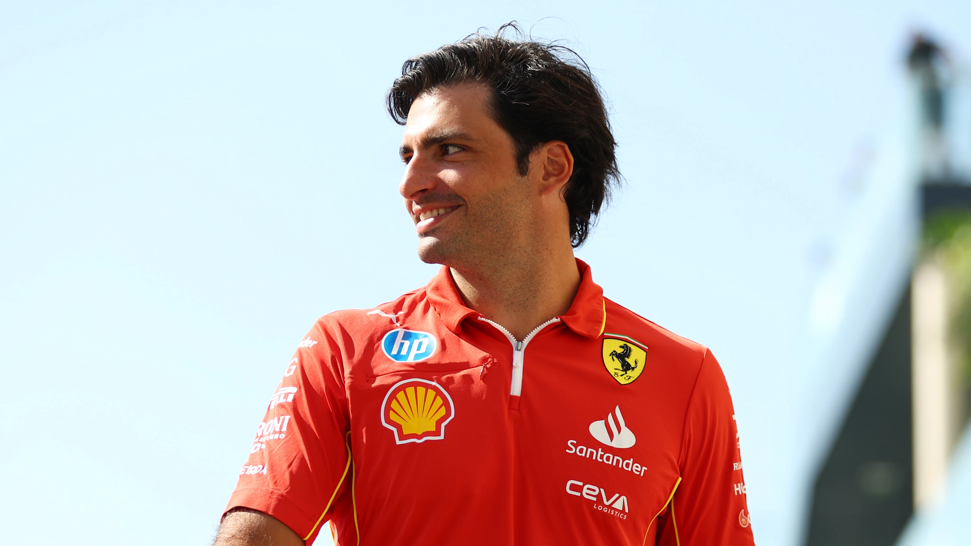 ABU DHABI, UNITED ARAB EMIRATES - DECEMBER 05: Carlos Sainz of Spain and Ferrari walks in the