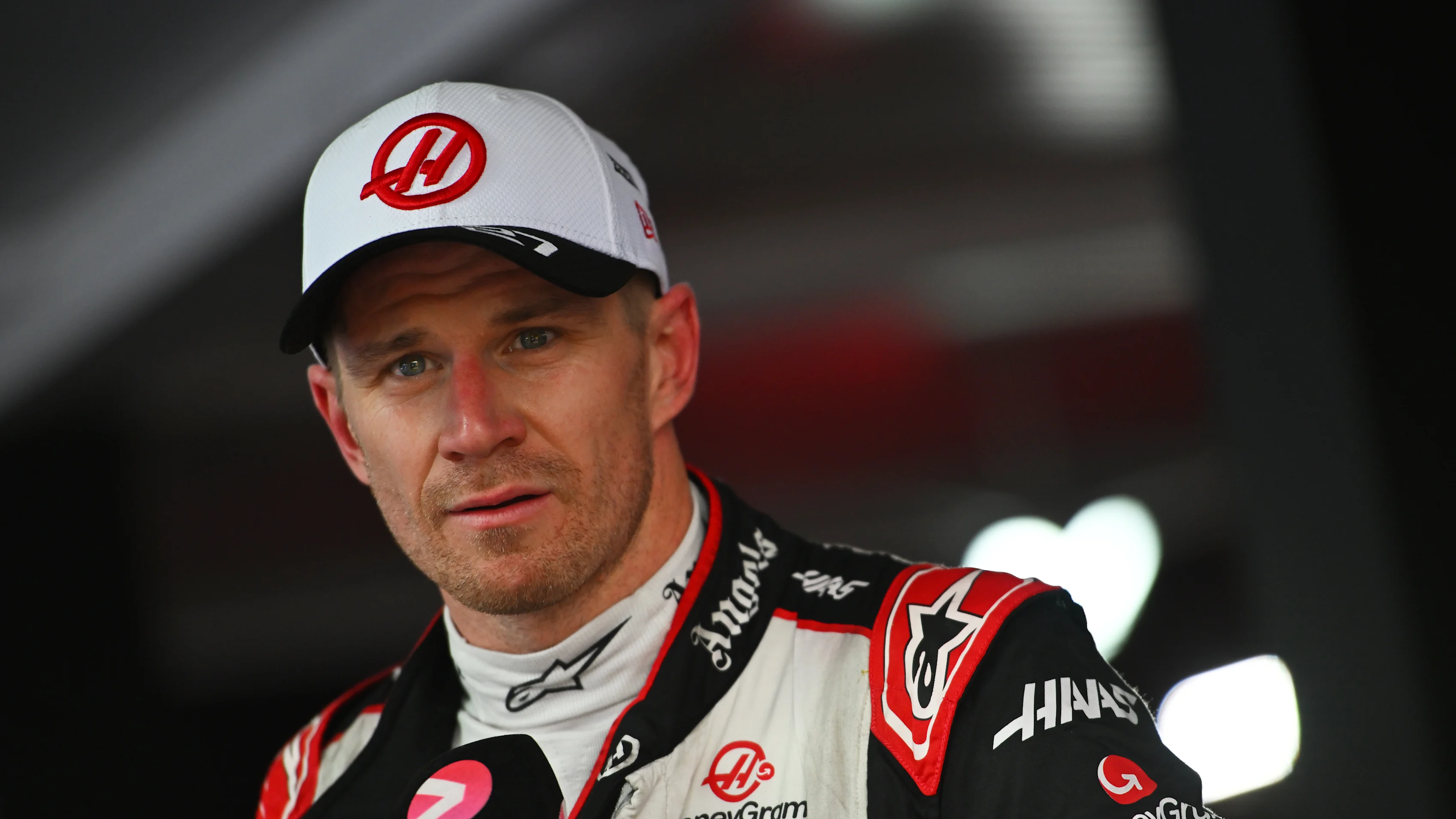 SPIELBERG, AUSTRIA - JUNE 30: 6th placed Nico Hulkenberg of Germany and Haas F1 talks to the media