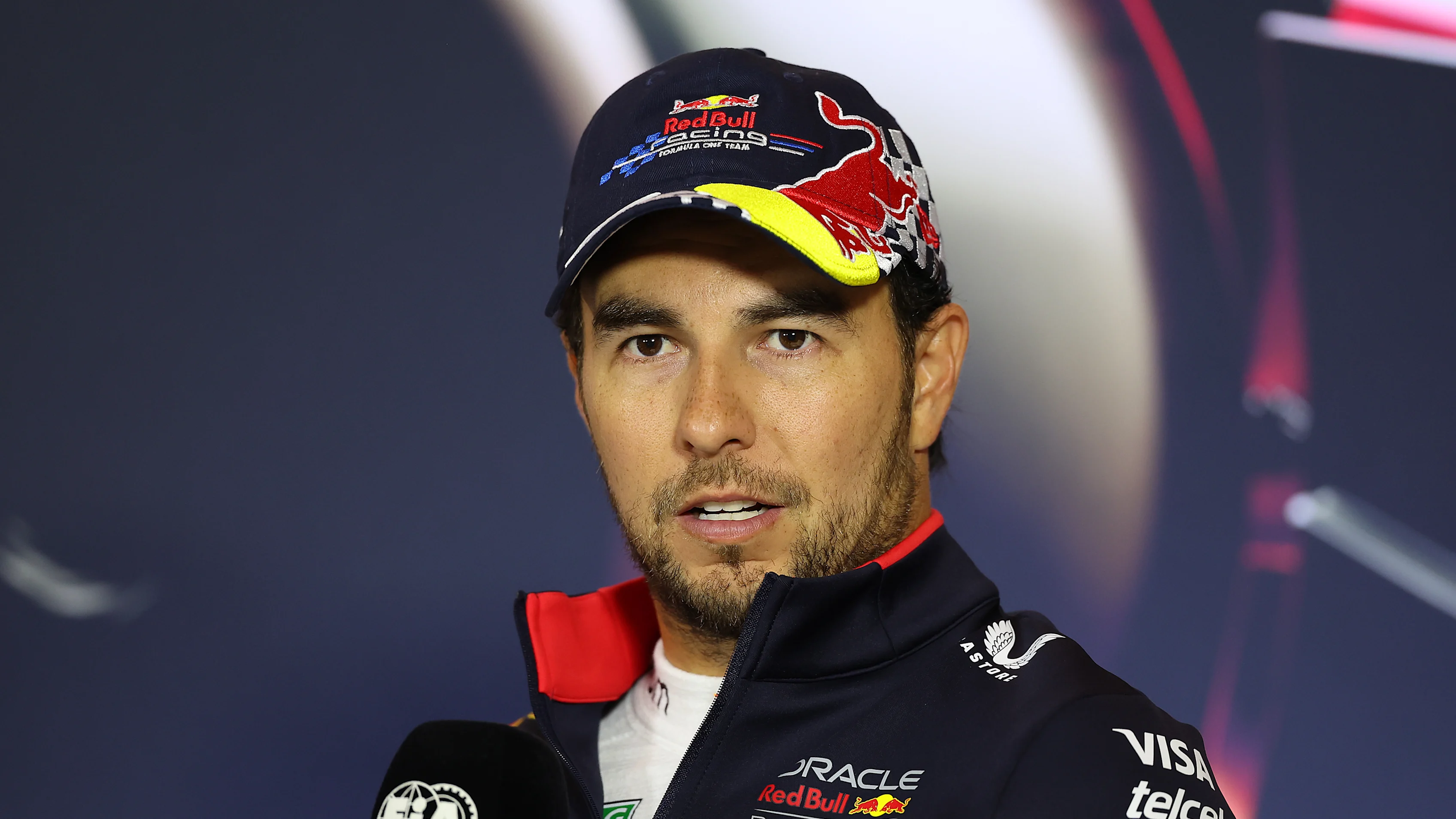 SHANGHAI, CHINA - APRIL 21: Third placed Sergio Perez of Mexico and Oracle Red Bull Racing attends