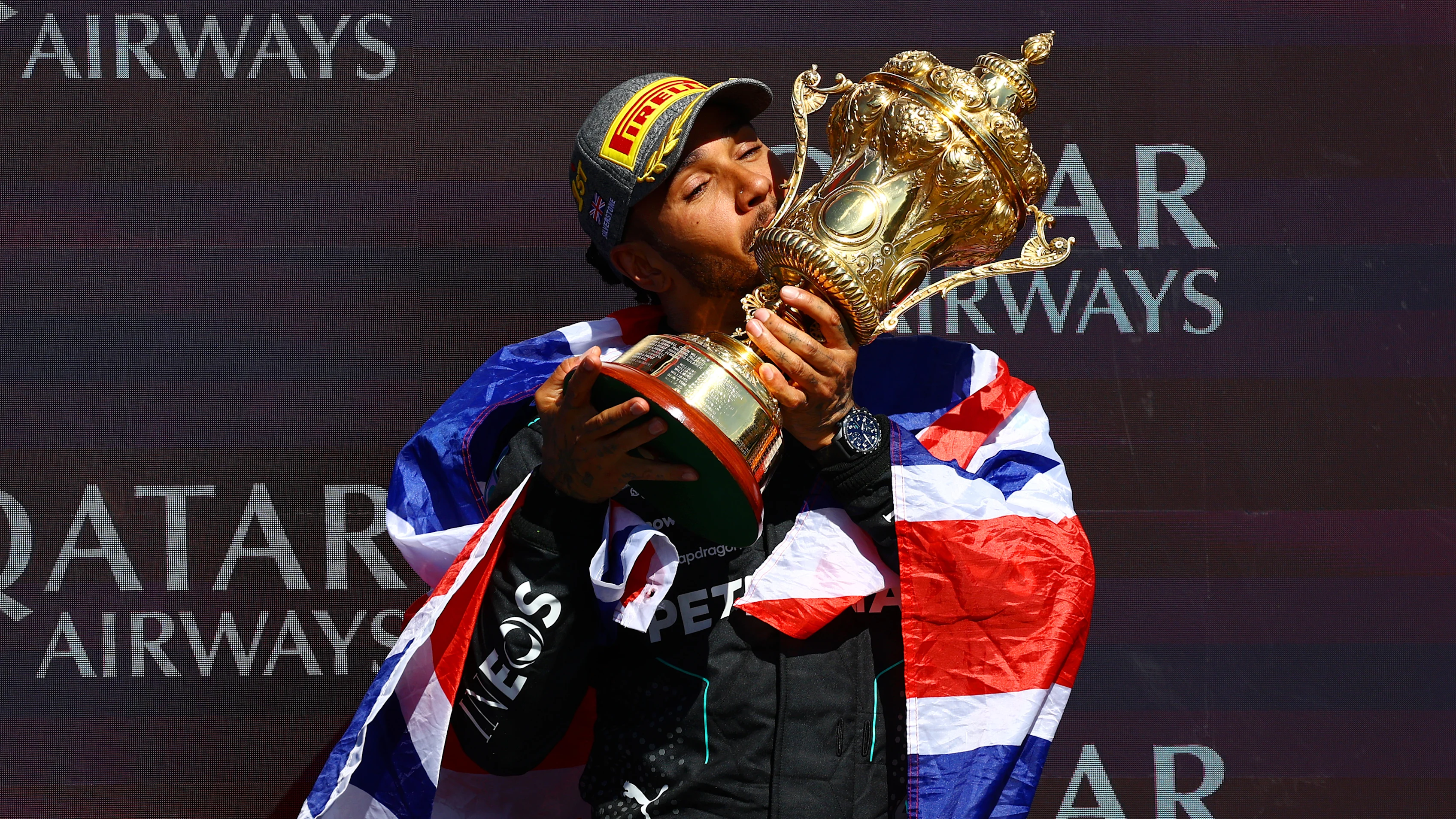 NORTHAMPTON, ENGLAND - JULY 07: Race winner Lewis Hamilton of Great Britain and Mercedes celebrates