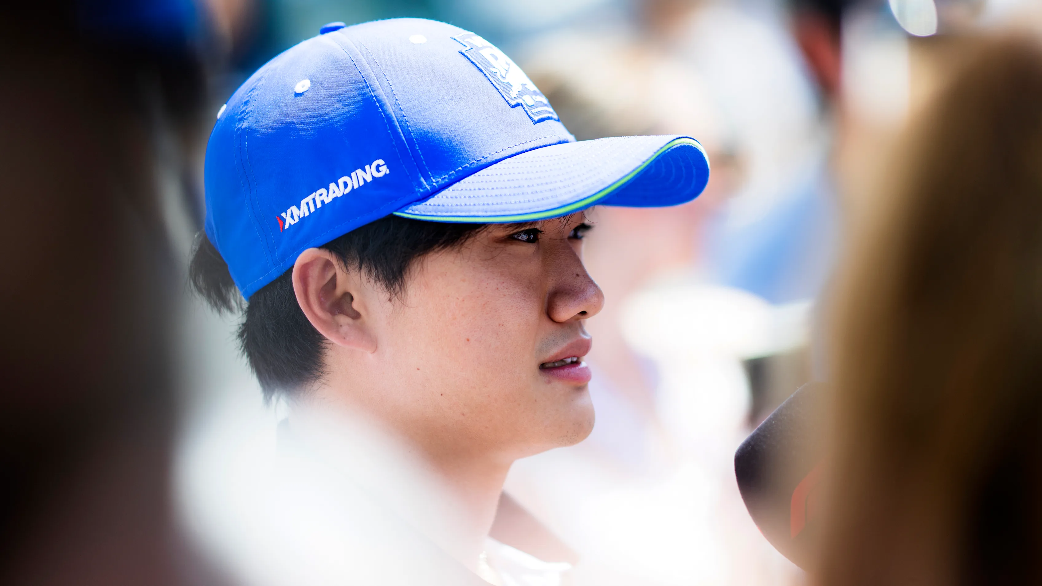 BUDAPEST, HUNGARY - JULY 18: Yuki Tsunoda of Japan and Visa Cash App RB talks to the media in the