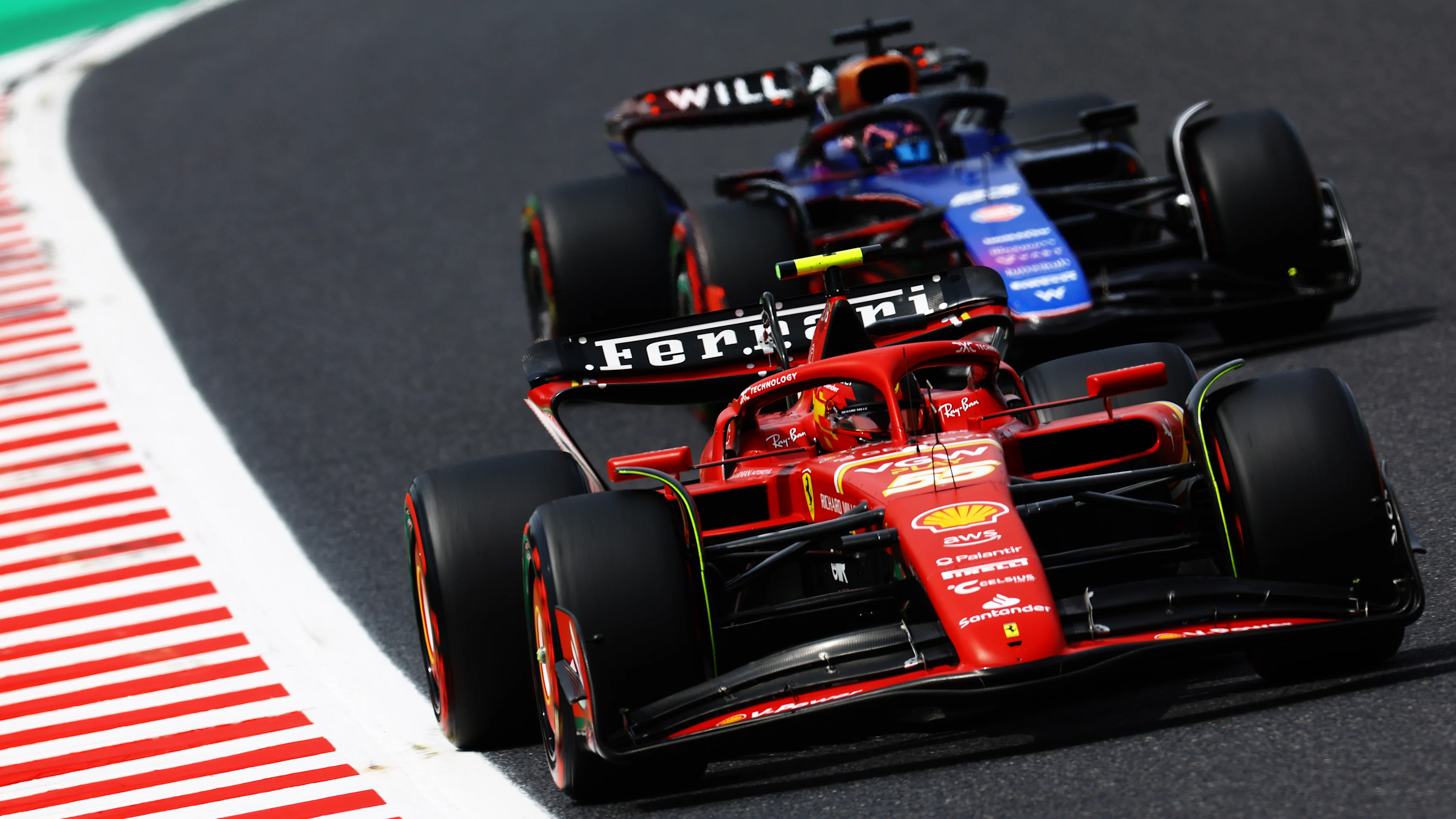 SUZUKA, JAPAN - APRIL 06: Carlos Sainz of Spain driving (55) the Ferrari SF-24 and Alexander Albon