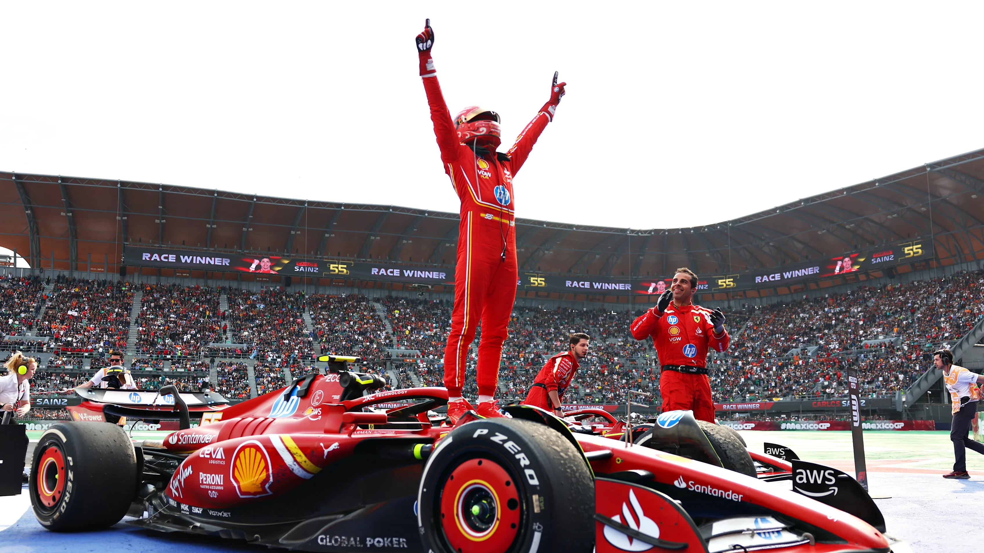 MEXICO CITY, MEXICO - OCTOBER 27: Race winner Carlos Sainz of Spain and Ferrari celebrates in parc
