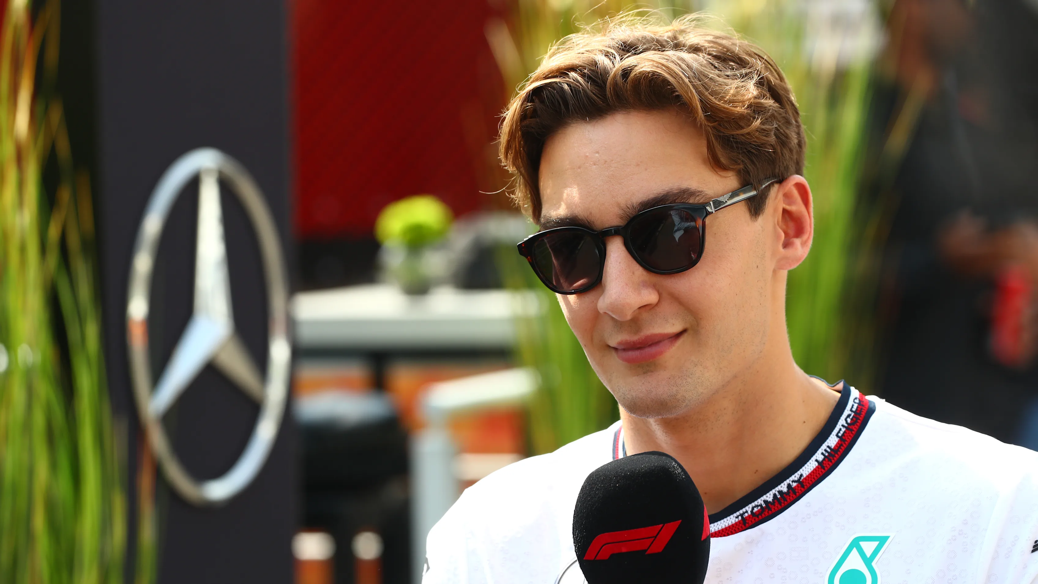 MEXICO CITY, MEXICO - OCTOBER 24: George Russell of Great Britain and Mercedes talks to the media