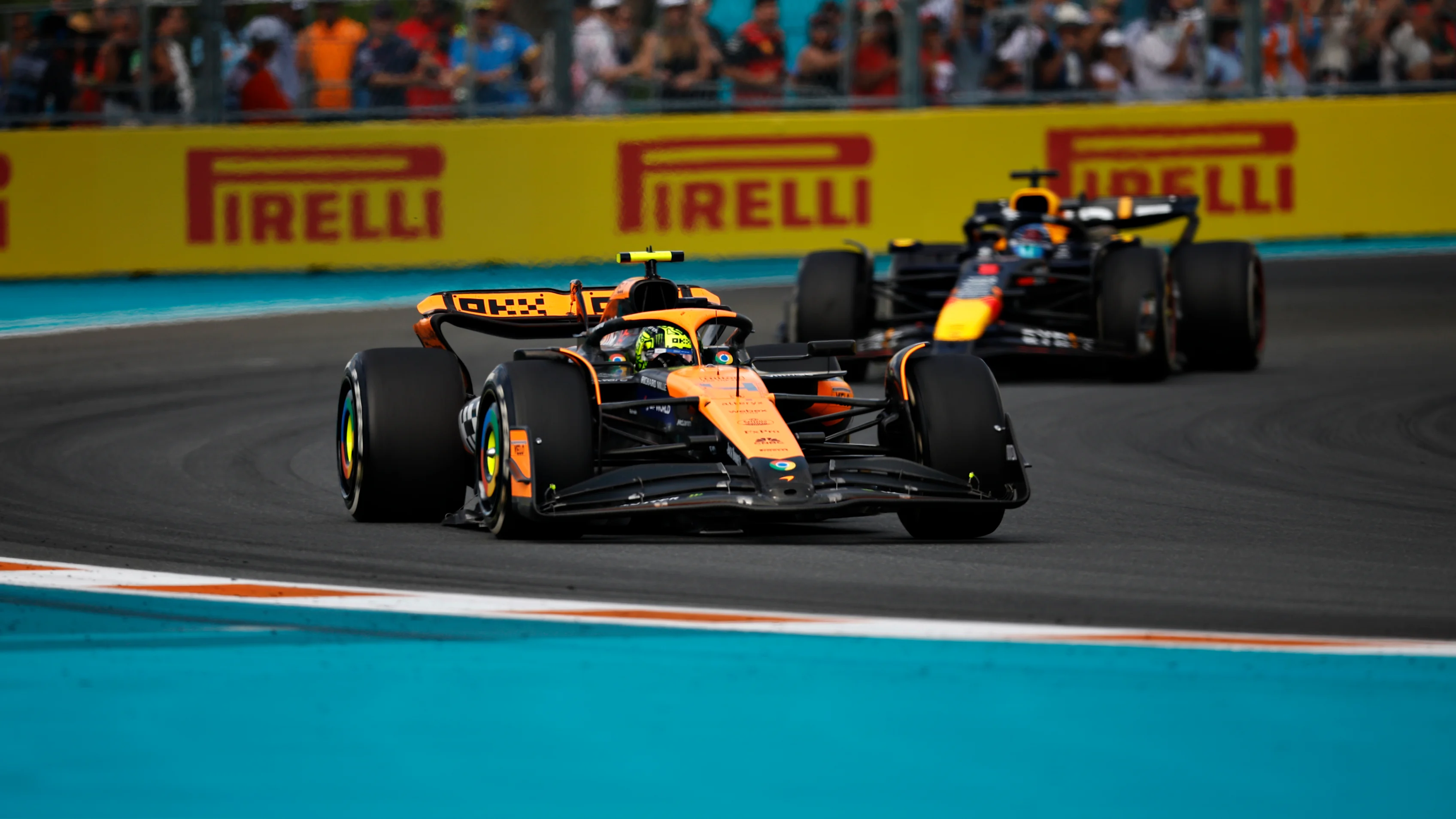 MIAMI, FLORIDA - MAY 05: Lando Norris of Great Britain driving the (4) McLaren MCL38 Mercedes leads