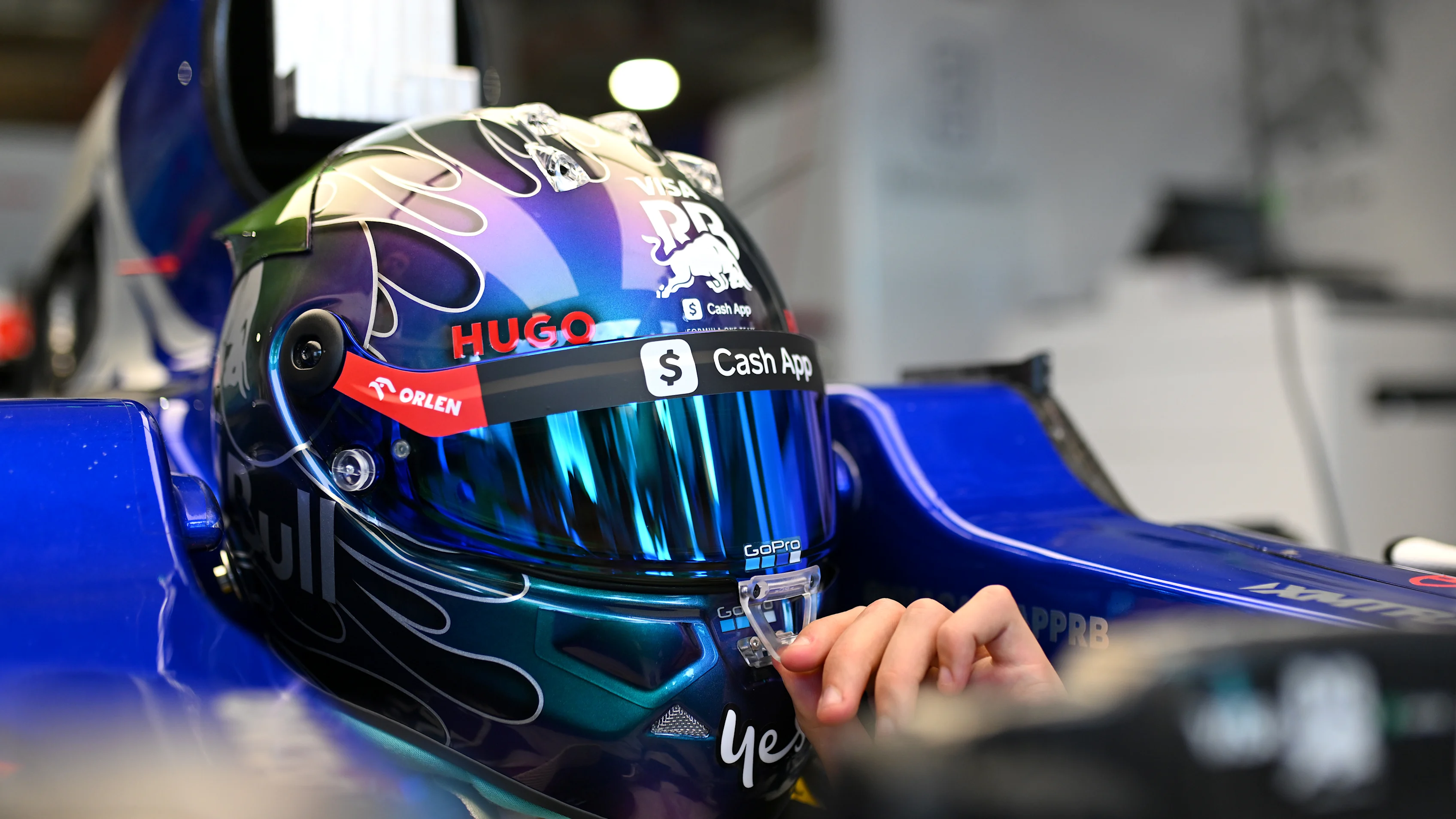 MIAMI, FLORIDA - MAY 02: Daniel Ricciardo of Australia and Visa Cash App RB has a seat fitting in