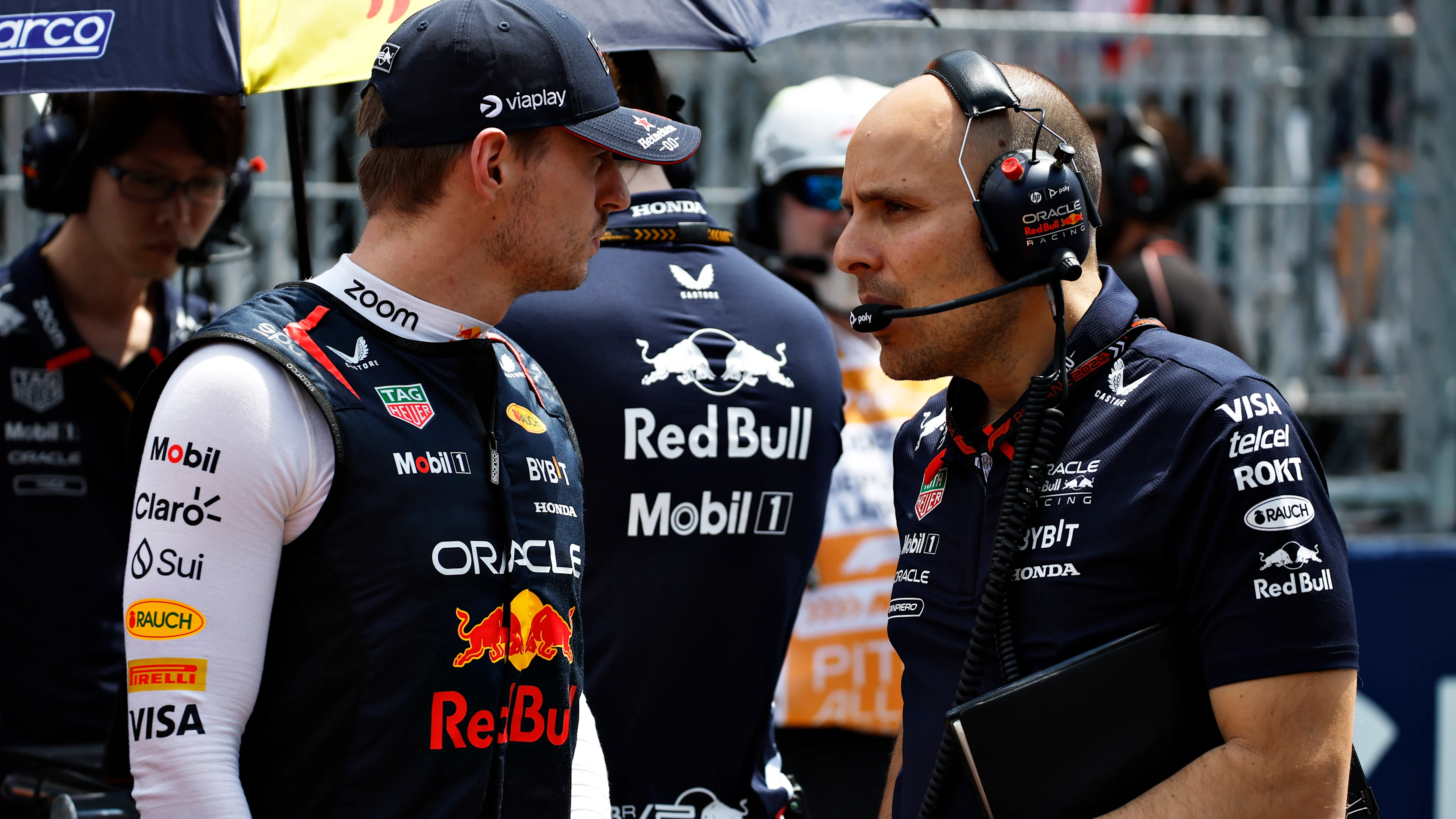 MIAMI, FLORIDA - MAY 04: Max Verstappen of the Netherlands and Oracle Red Bull Racing talks with