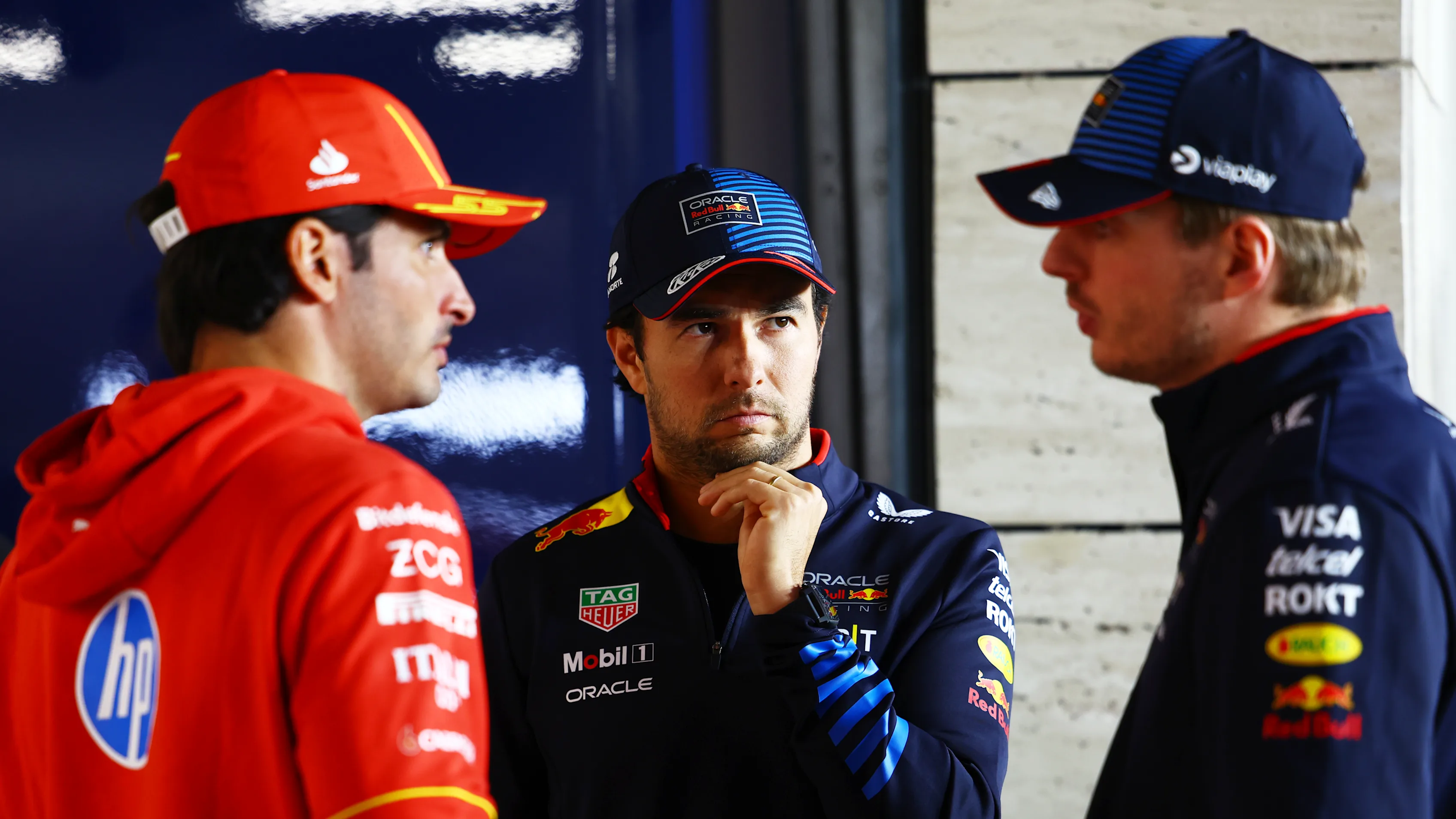 LUSAIL CITY, QATAR - DECEMBER 01: Sergio Perez of Mexico and Oracle Red Bull Racing, Max Verstappen