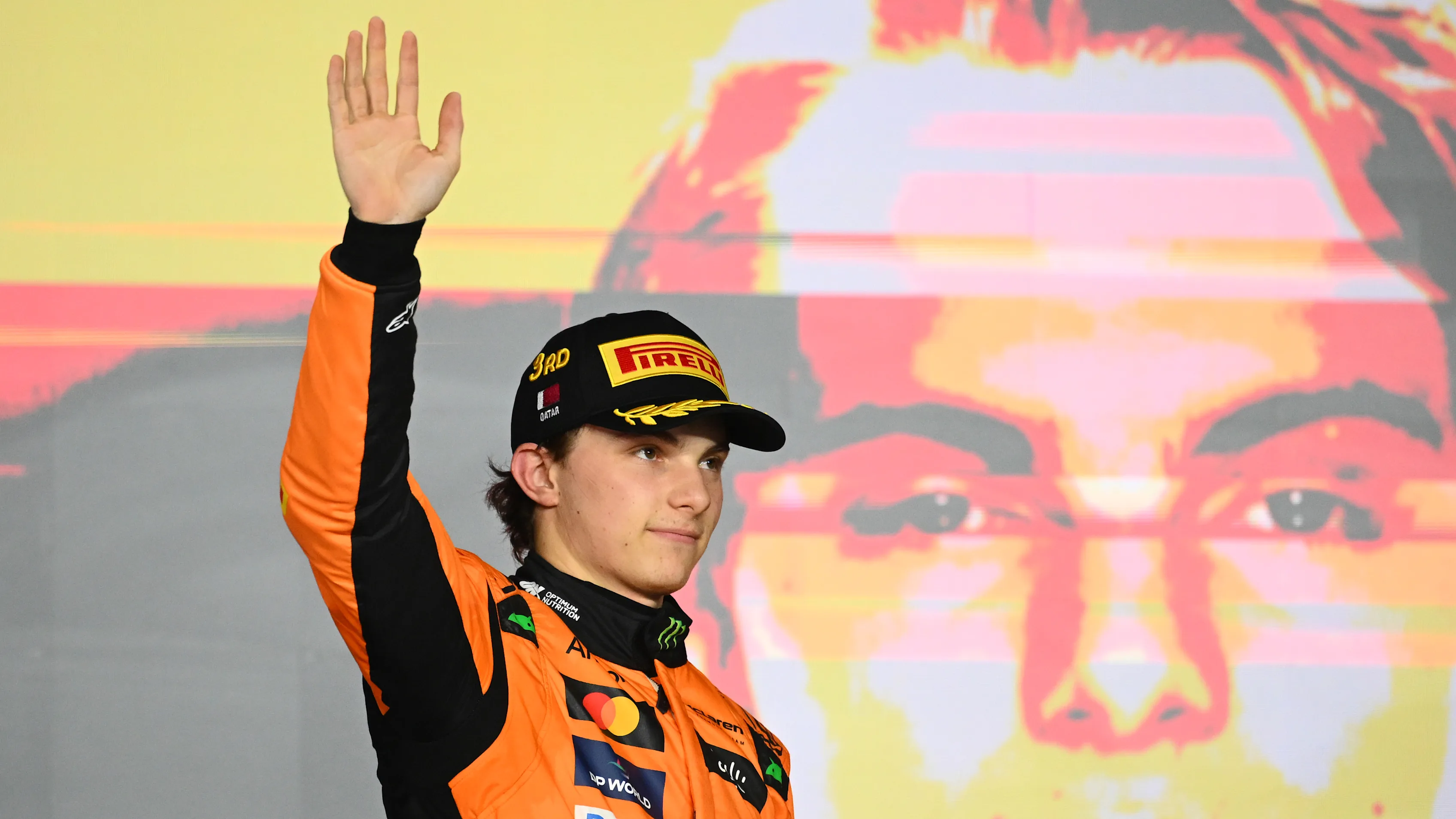 LUSAIL CITY, QATAR - DECEMBER 01: Third placed Oscar Piastri of Australia and McLaren celebrates on
