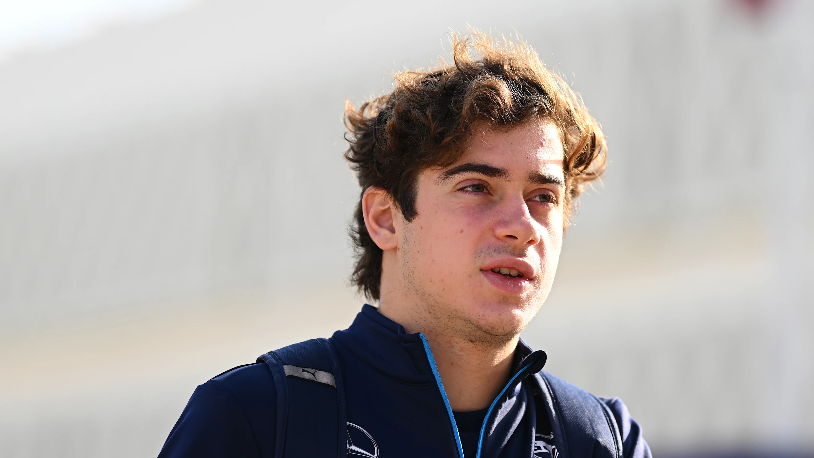 LUSAIL CITY, QATAR - NOVEMBER 30: Franco Colapinto of Argentina and Williams walks in the Paddock