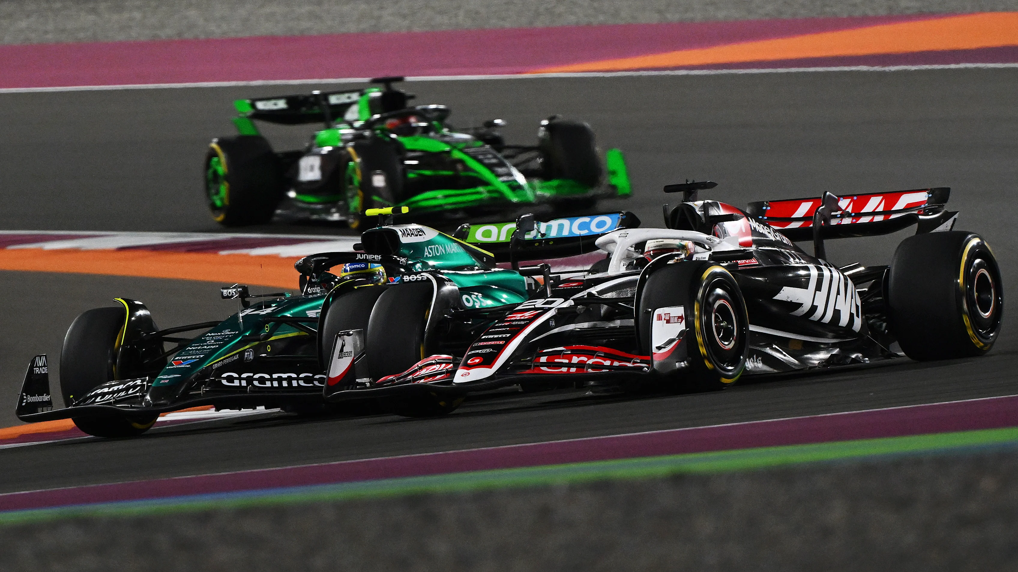 LUSAIL CITY, QATAR - NOVEMBER 30: Fernando Alonso of Spain driving the (14) Aston Martin AMR24