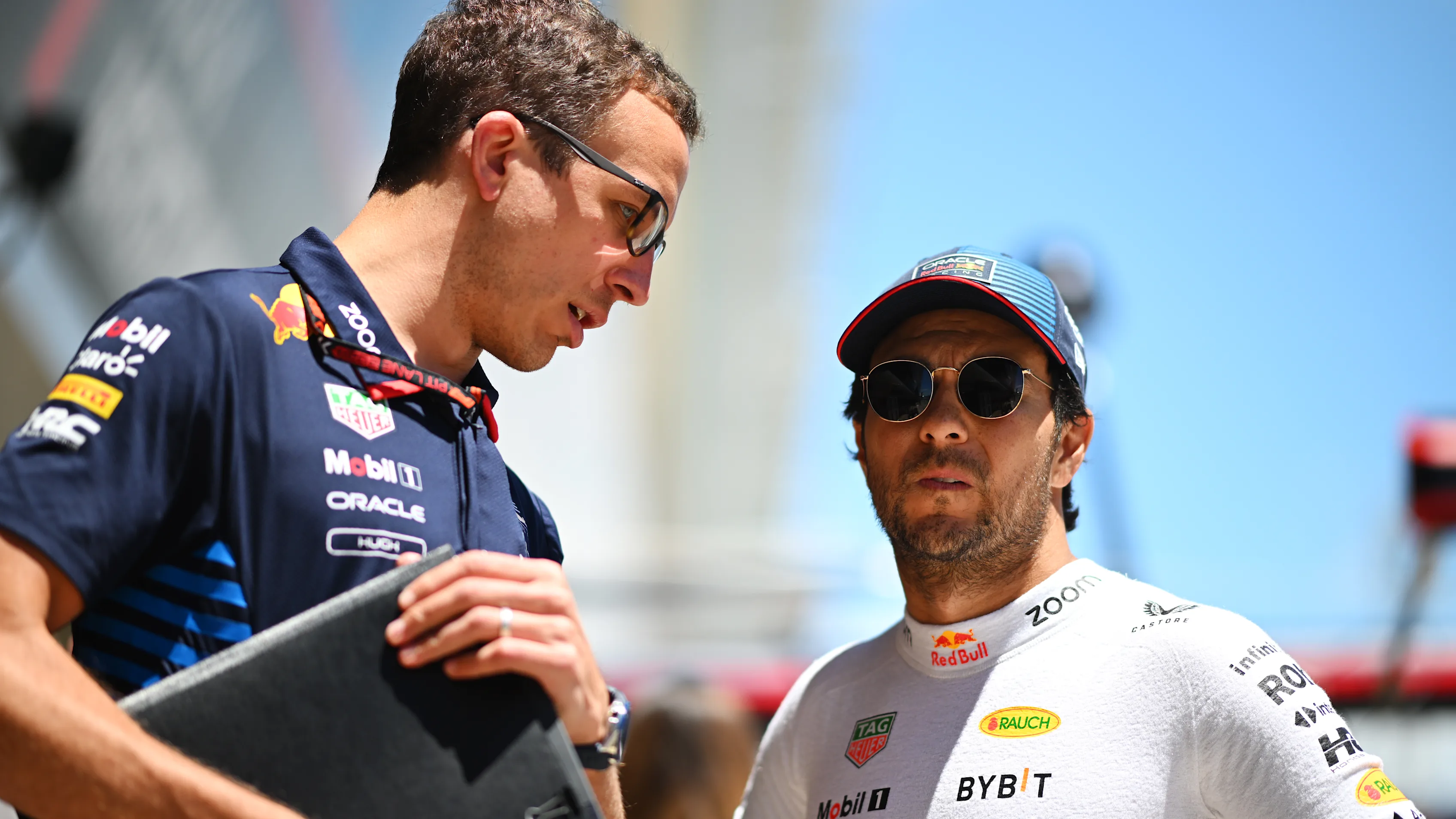 BARCELONA, SPAIN - JUNE 21: Sergio Perez of Mexico and Oracle Red Bull Racing talks with race