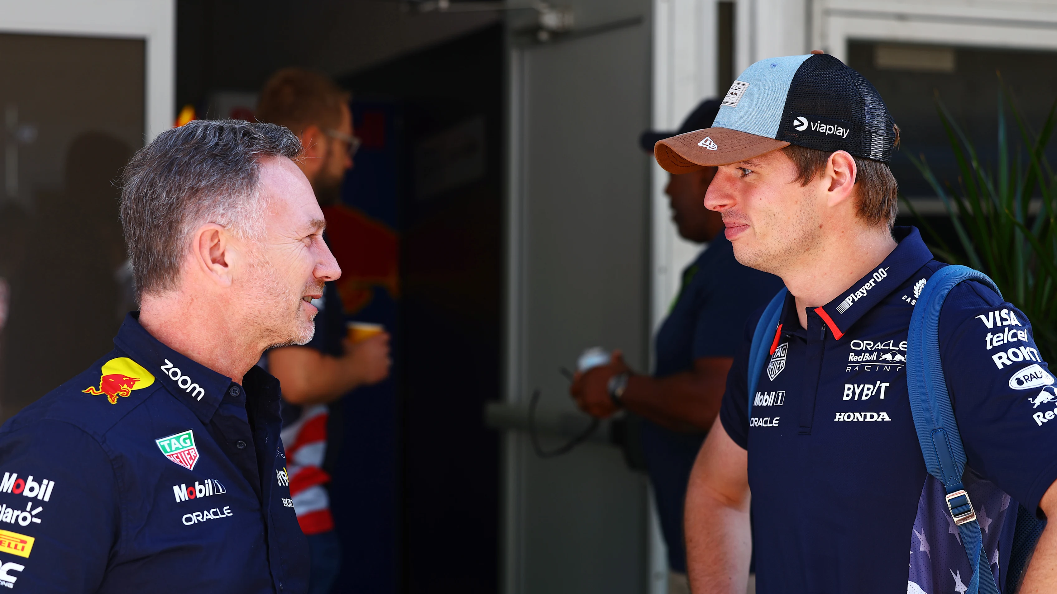 AUSTIN, TEXAS - OCTOBER 20: Oracle Red Bull Racing Team Principal Christian Horner talks with Max