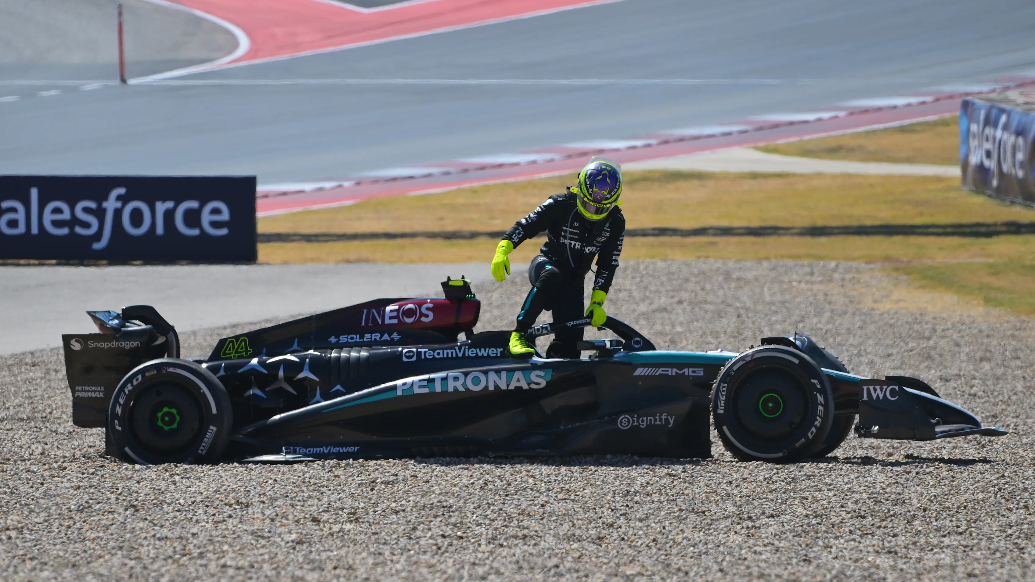 AUSTIN, TEXAS - OCTOBER 20: Lewis Hamilton of Great Britain and Mercedes climbs from his car to