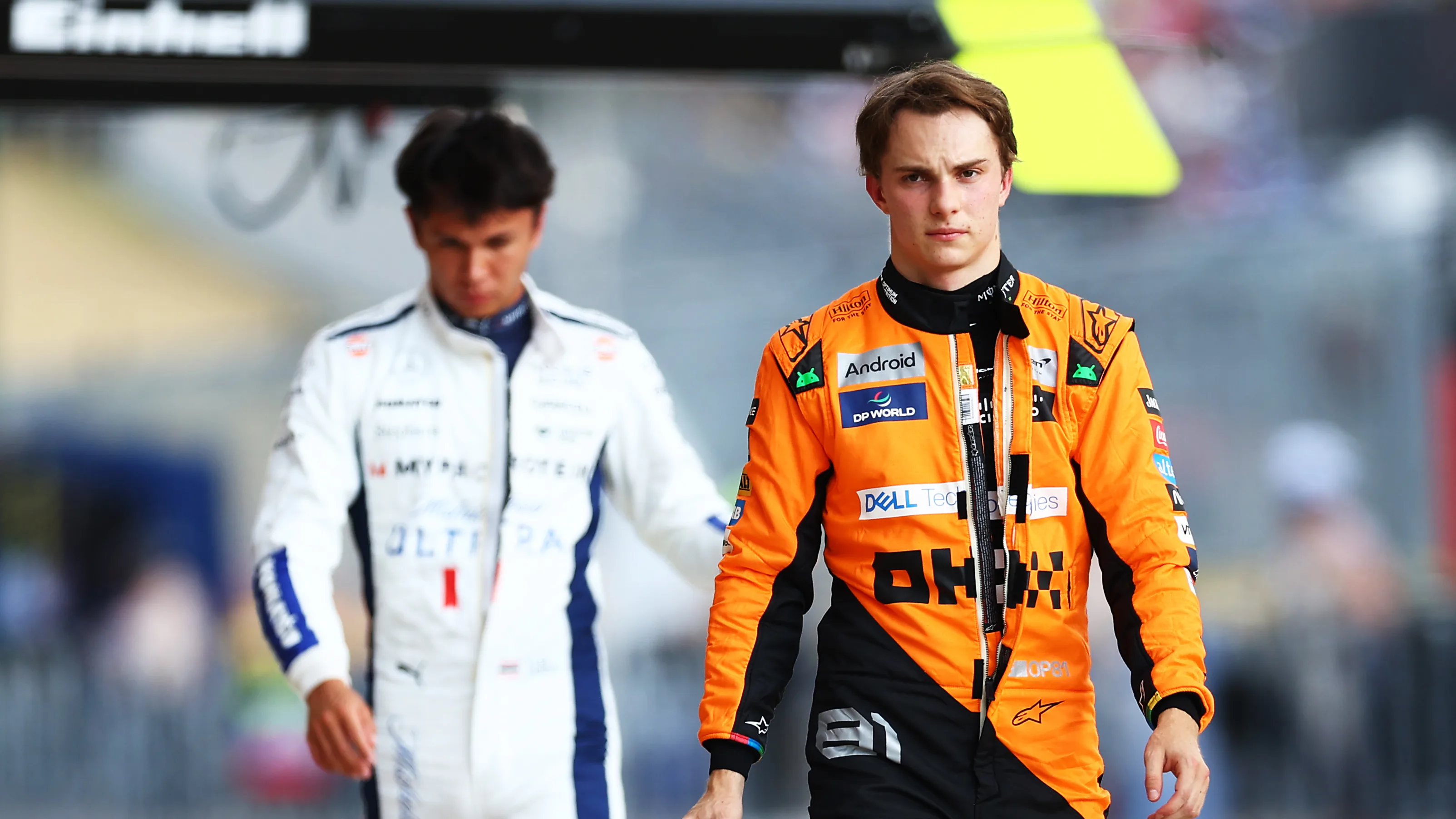 AUSTIN, TEXAS - OCTOBER 18: 16th placed qualifier Oscar Piastri of Australia and McLaren walks in