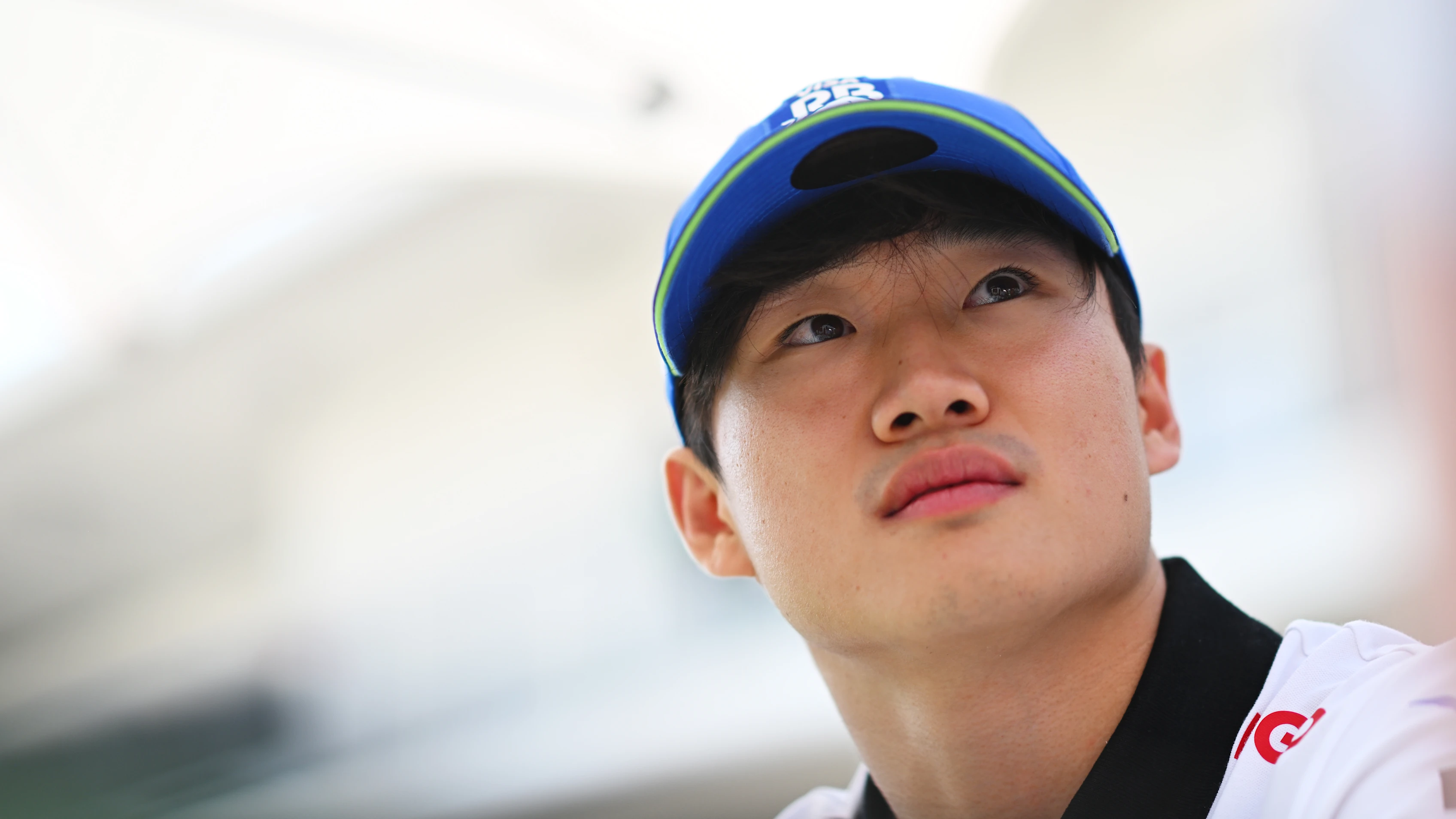 AUSTIN, TEXAS - OCTOBER 17: Yuki Tsunoda of Japan and Visa Cash App RB looks on in the Paddock