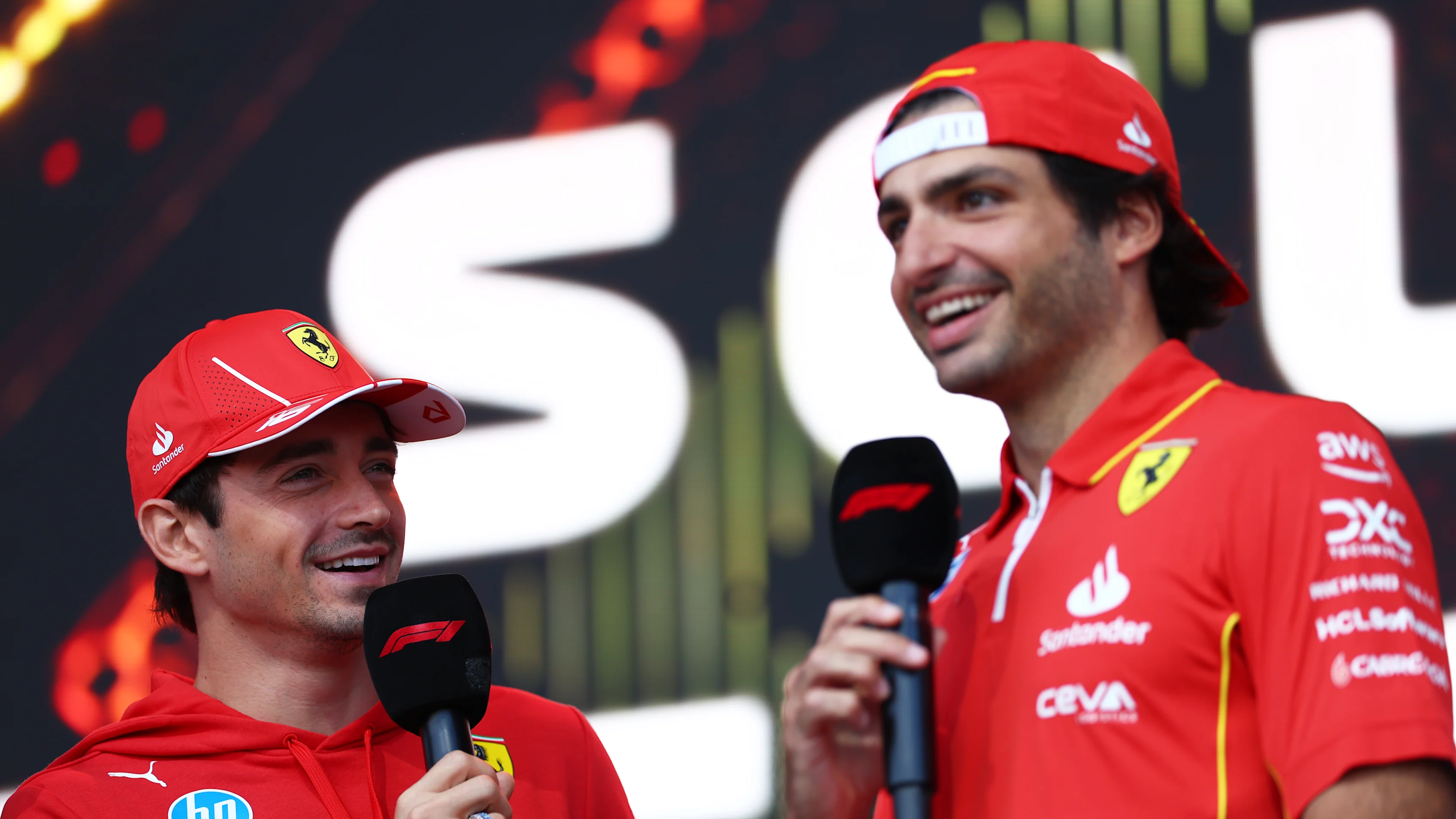 AUSTIN, TEXAS - OCTOBER 19: Charles Leclerc of Monaco and Ferrari and Carlos Sainz of Spain and