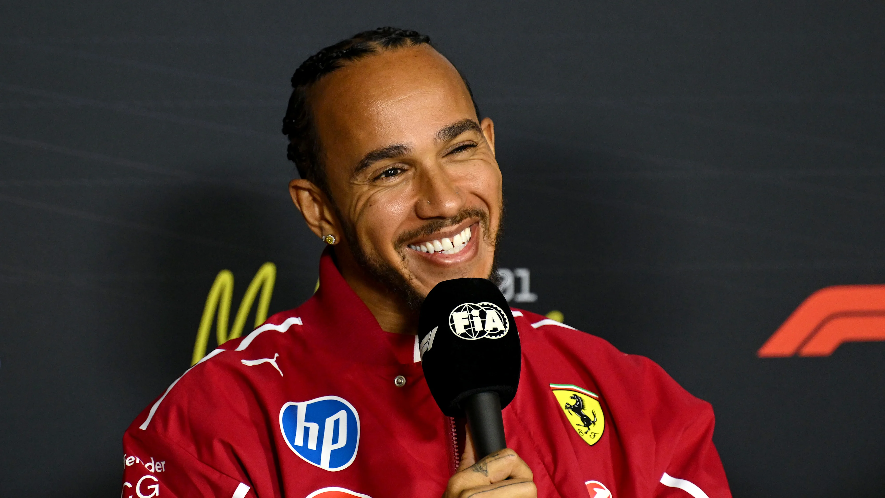 MELBOURNE, AUSTRALIA - MARCH 13: Lewis Hamilton of Great Britain and Scuderia Ferrari in the Press