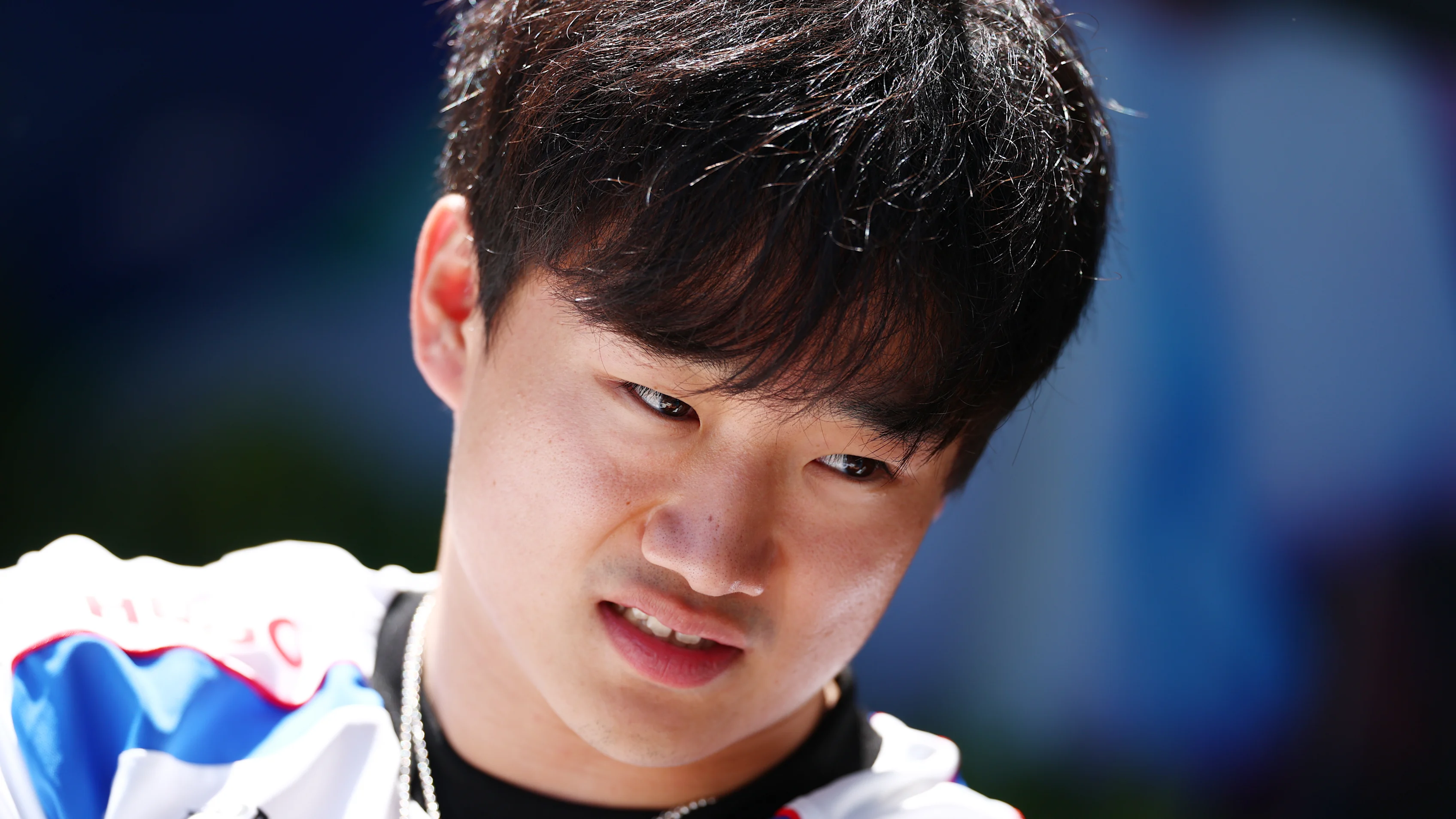 MELBOURNE, AUSTRALIA - MARCH 13: Yuki Tsunoda of Japan and Visa Cash App Racing Bulls looks on