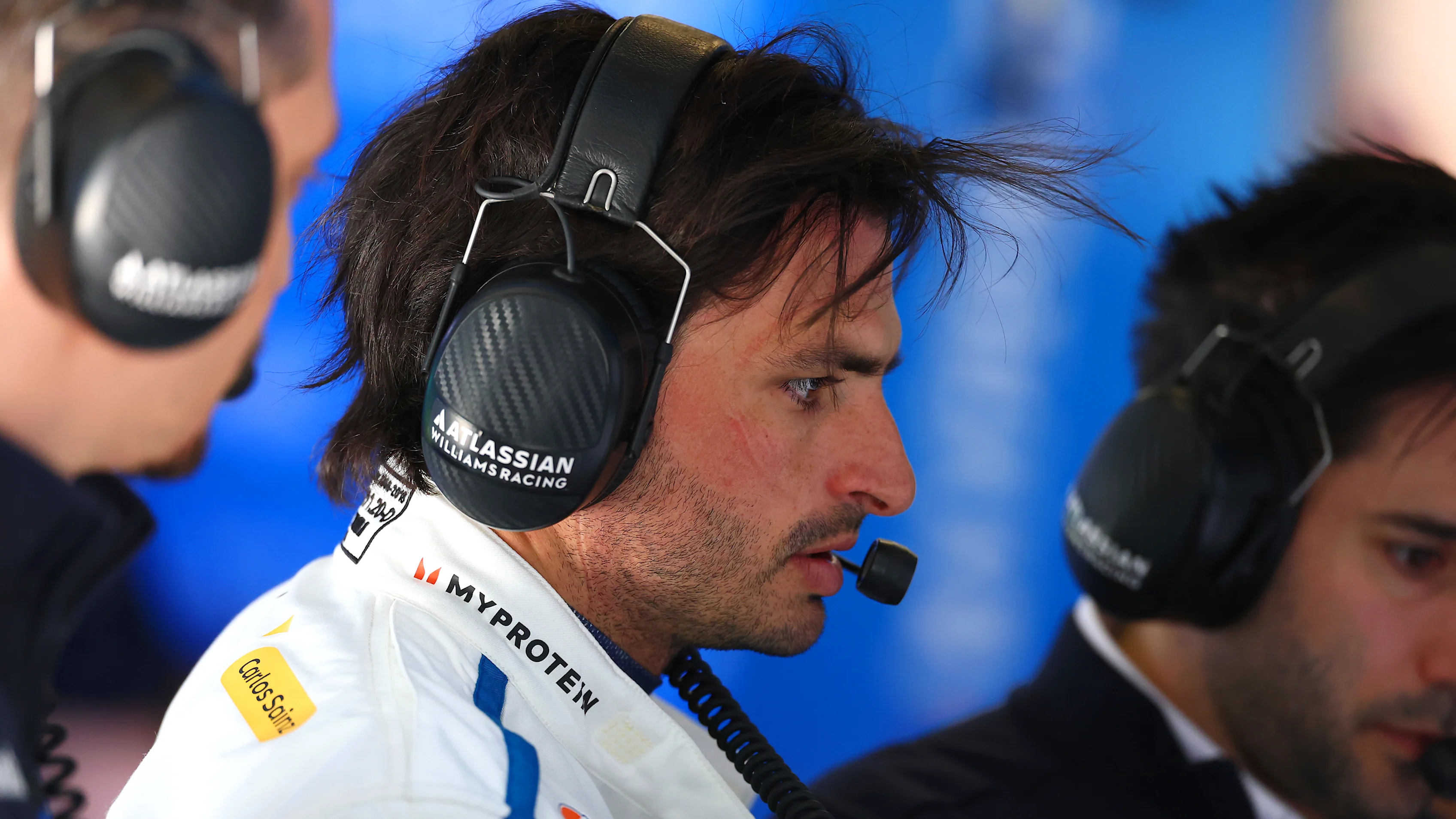 SHANGHAI, CHINA - MARCH 21: Carlos Sainz of Spain and Williams looks on in the garage during