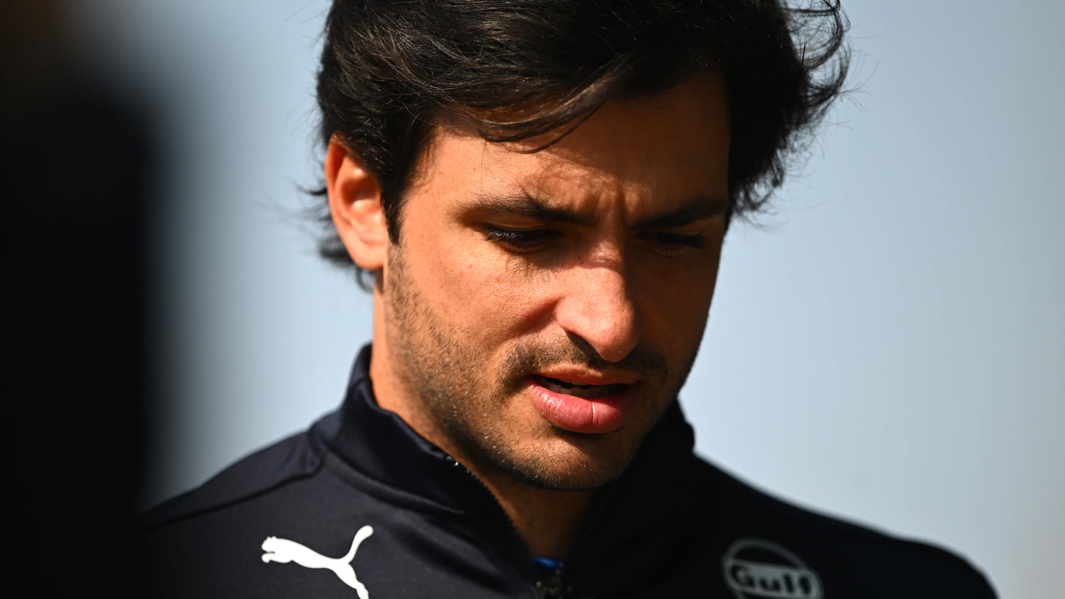 SHANGHAI, CHINA - MARCH 20: Carlos Sainz of Spain and Williams looks on in the Paddock during