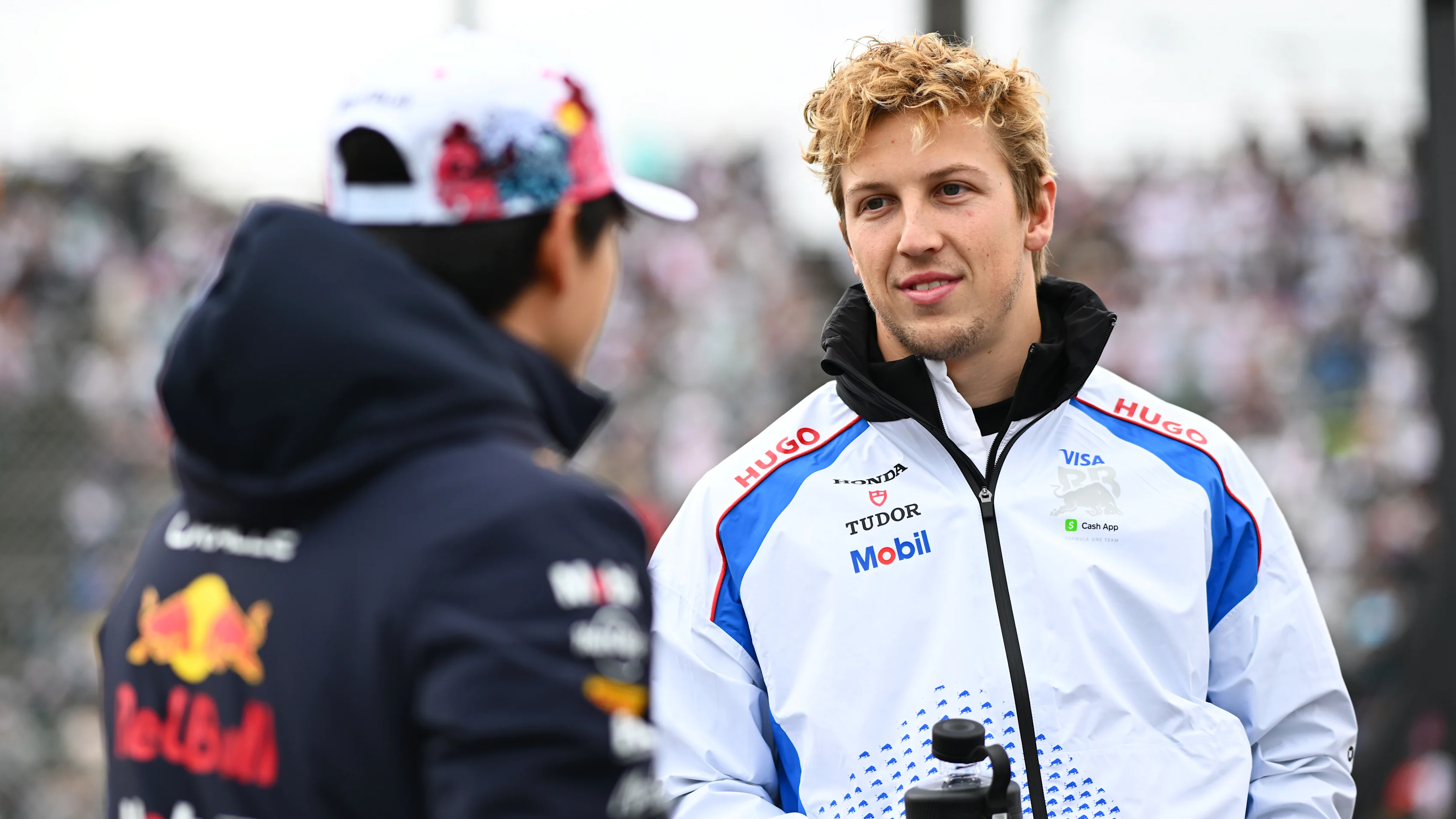 SUZUKA, JAPAN - APRIL 06: Yuki Tsunoda of Japan and Oracle Red Bull Racing and Liam Lawson of New