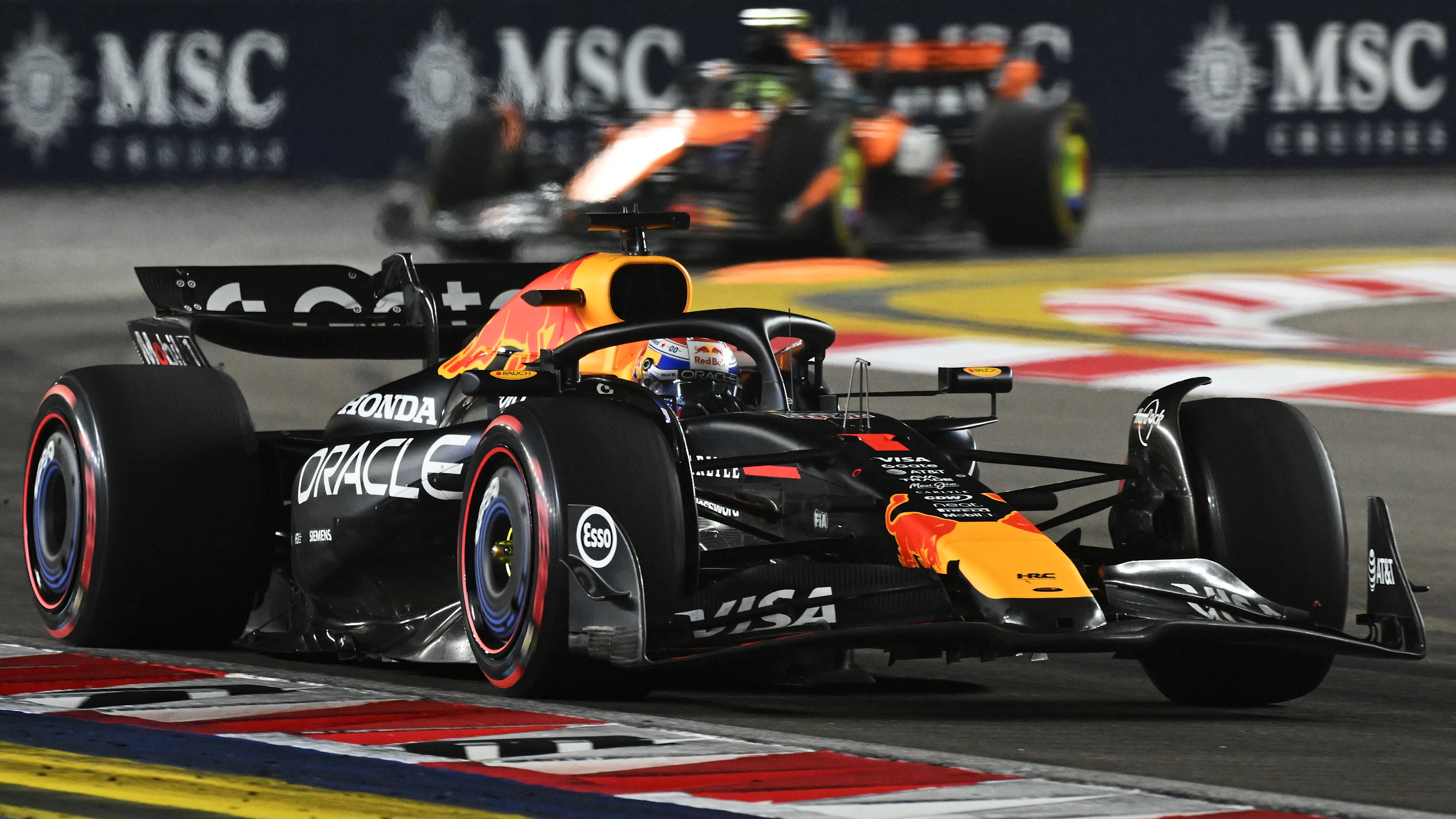 SINGAPORE, SINGAPORE - OCTOBER 05: Max Verstappen of the Netherlands driving the (1) Oracle Red