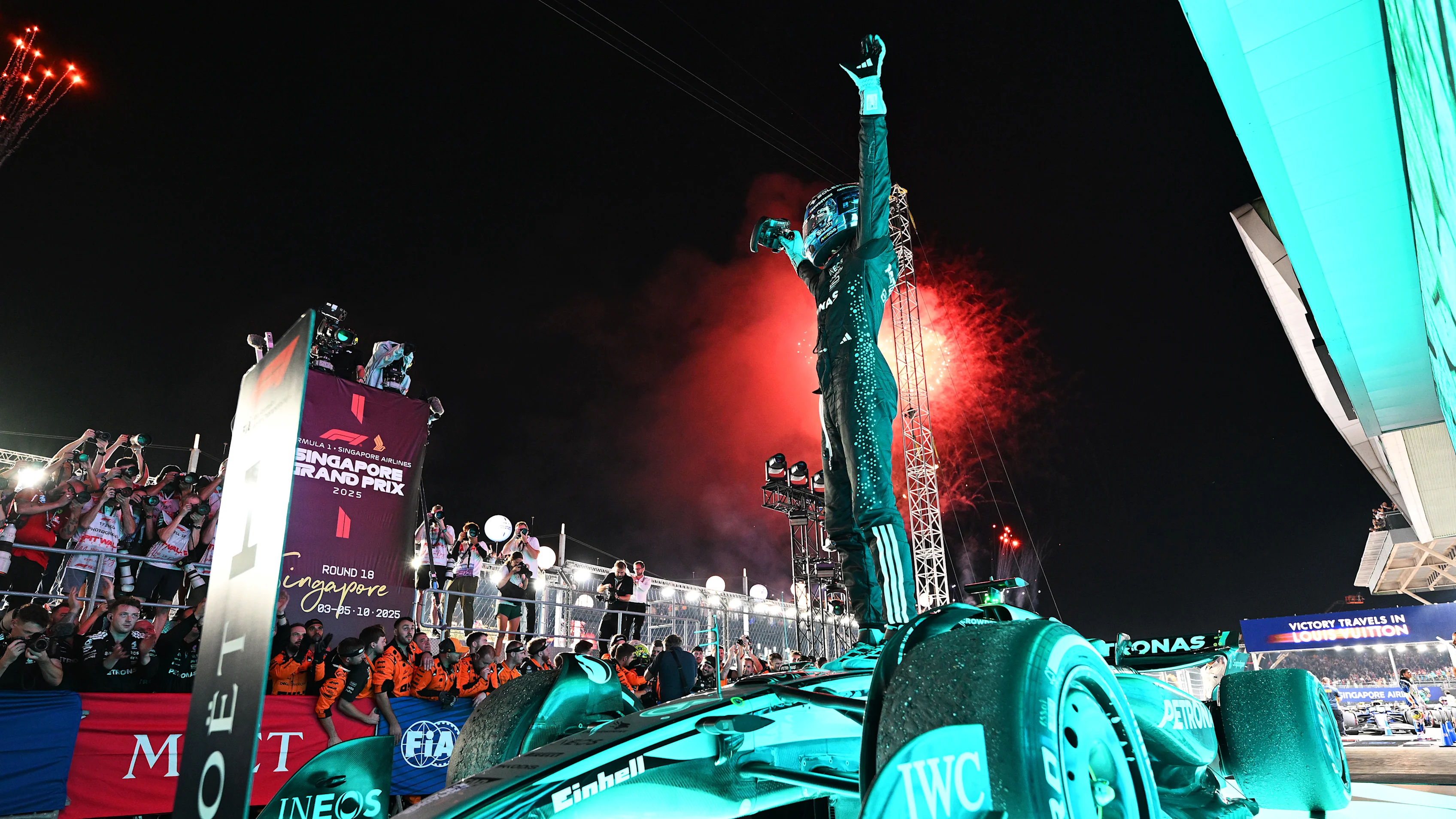 SINGAPORE, SINGAPORE - OCTOBER 05: Race winner George Russell of Great Britain and Mercedes AMG Petronas F1 Team celebrates in parc ferme during the F1 Grand Prix of Singapore at Marina Bay Street Circuit on October 05, 2025 in Singapore, Singapore. (Photo by Mark Sutton - Formula 1/Formula 1 via Getty Images)