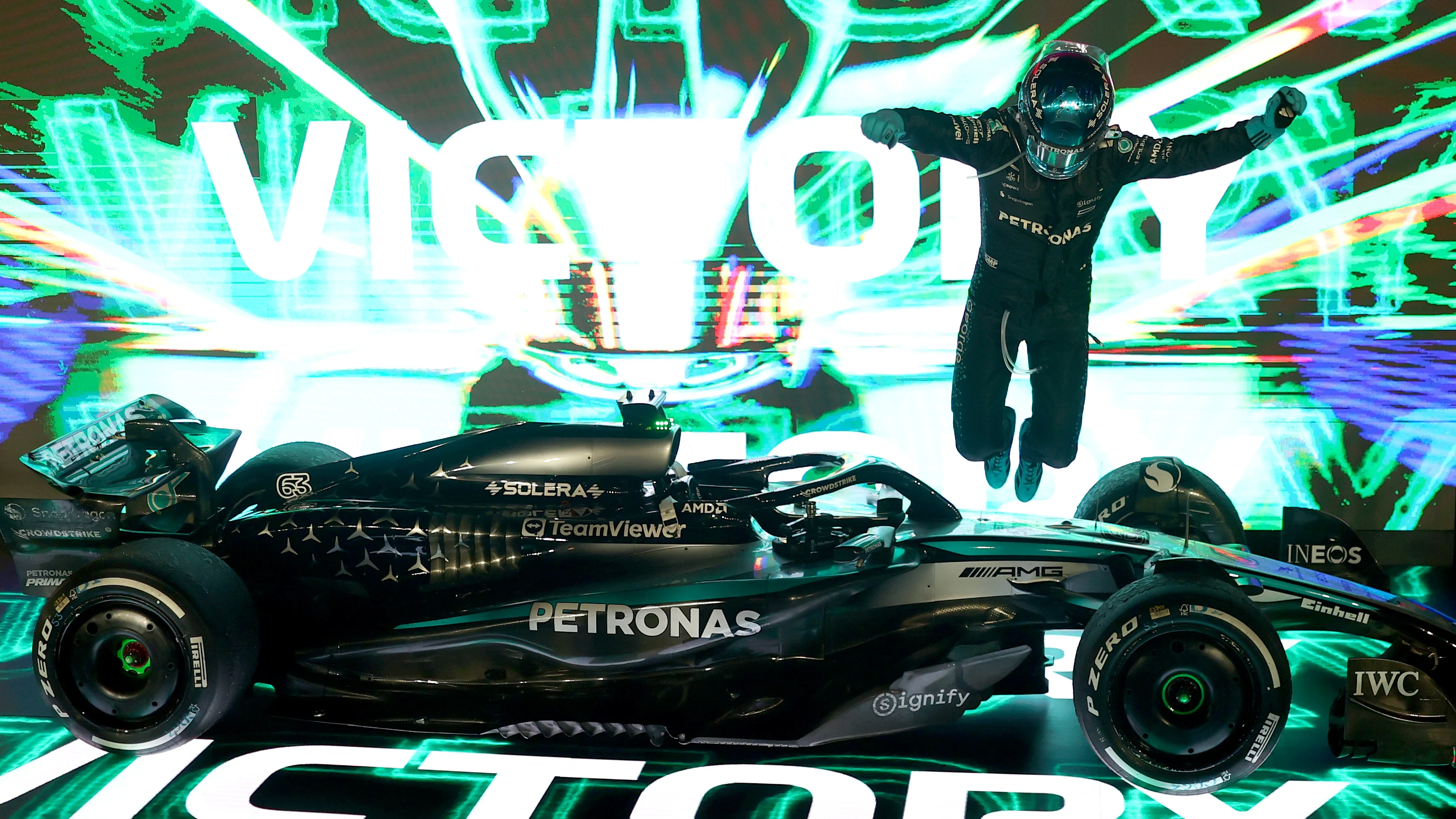 SINGAPORE, SINGAPORE - OCTOBER 05: Race winner George Russell of Great Britain and Mercedes AMG