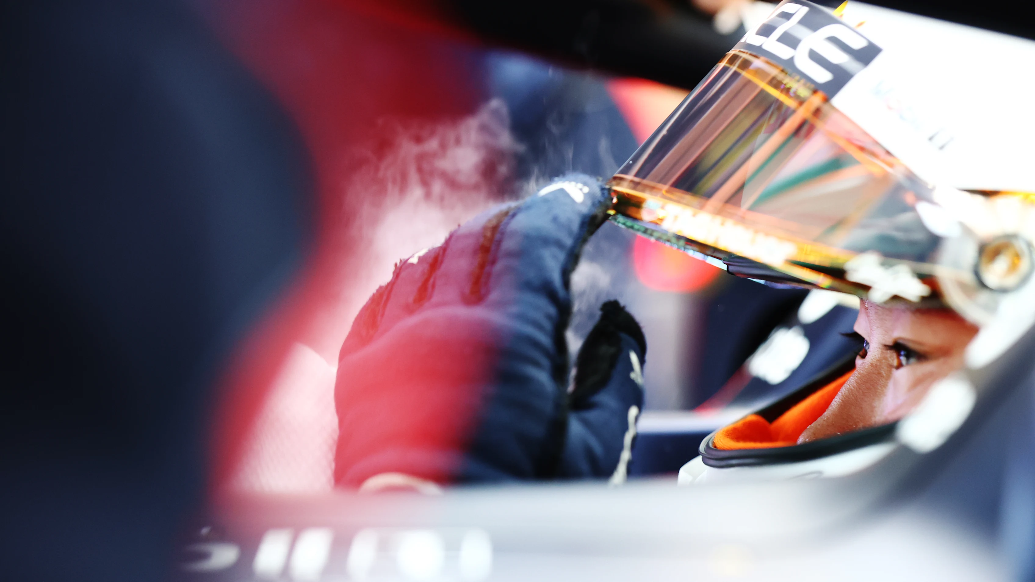 SINGAPORE, SINGAPORE - OCTOBER 03: Yuki Tsunoda of Japan and Oracle Red Bull Racing prior to during