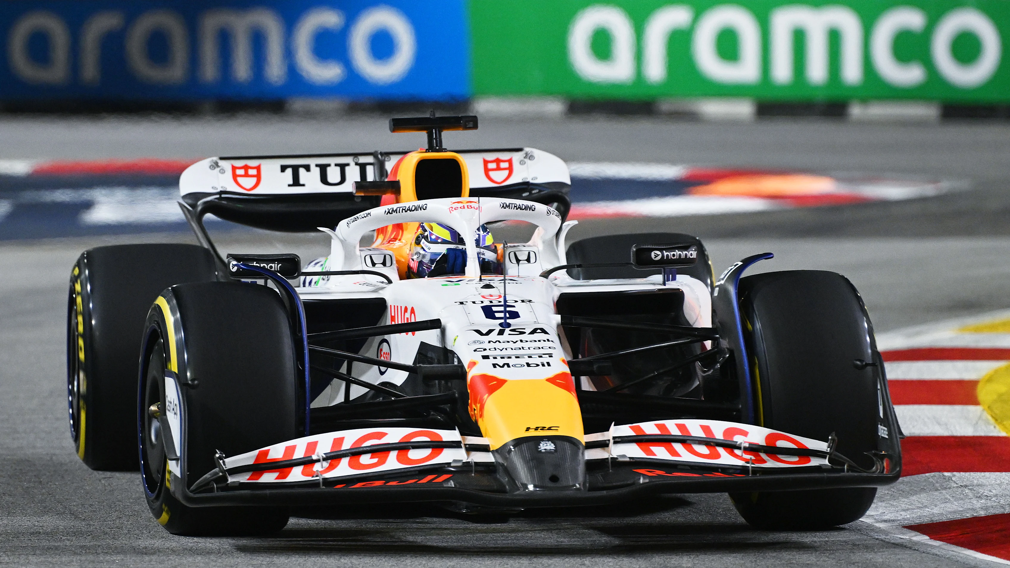 SINGAPORE, SINGAPORE - OCTOBER 03: Isack Hadjar of France driving the (6) Visa Cash App Racing