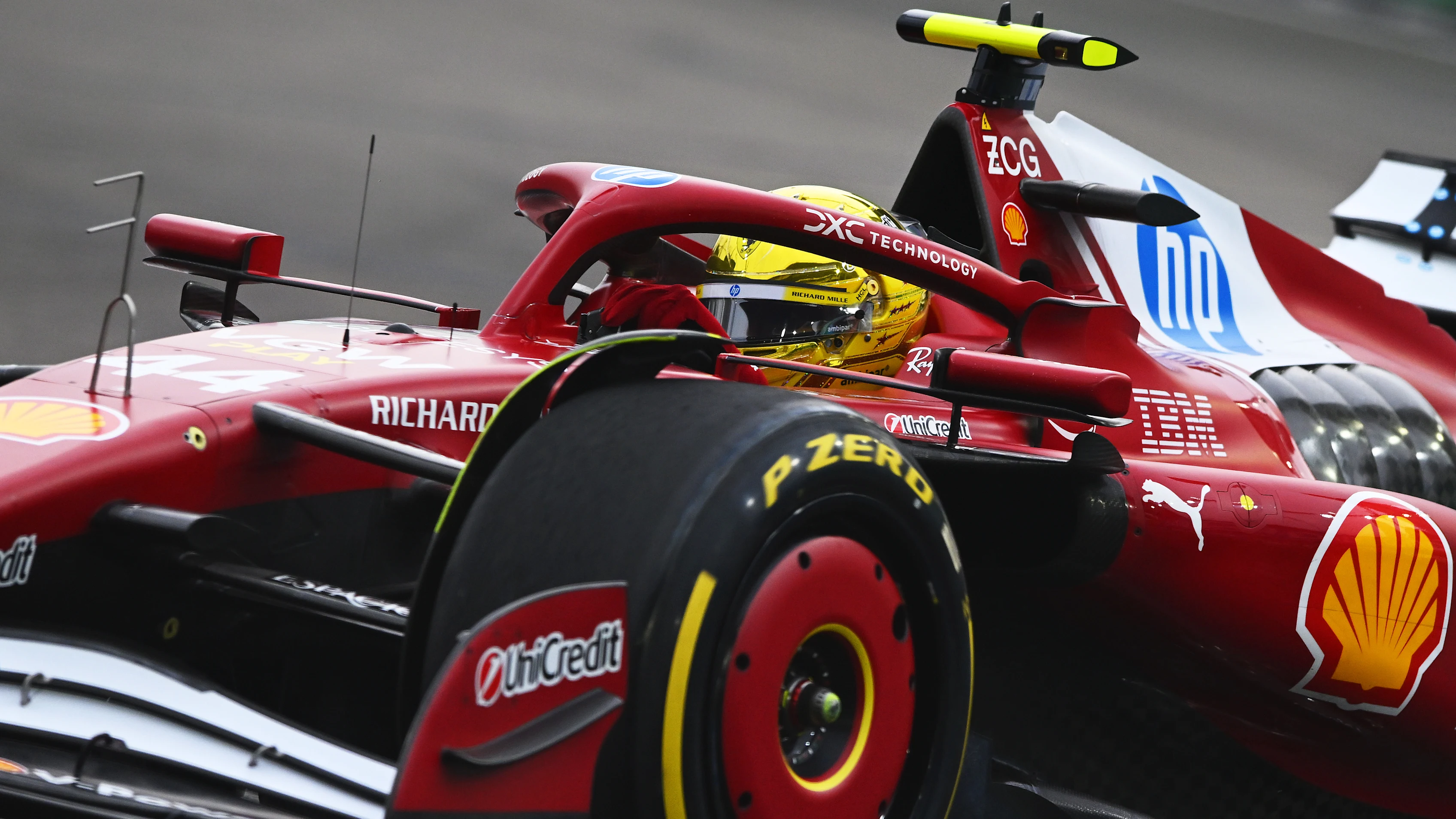 SINGAPORE, SINGAPORE - OCTOBER 04: Lewis Hamilton of Great Britain driving the (44) Scuderia
