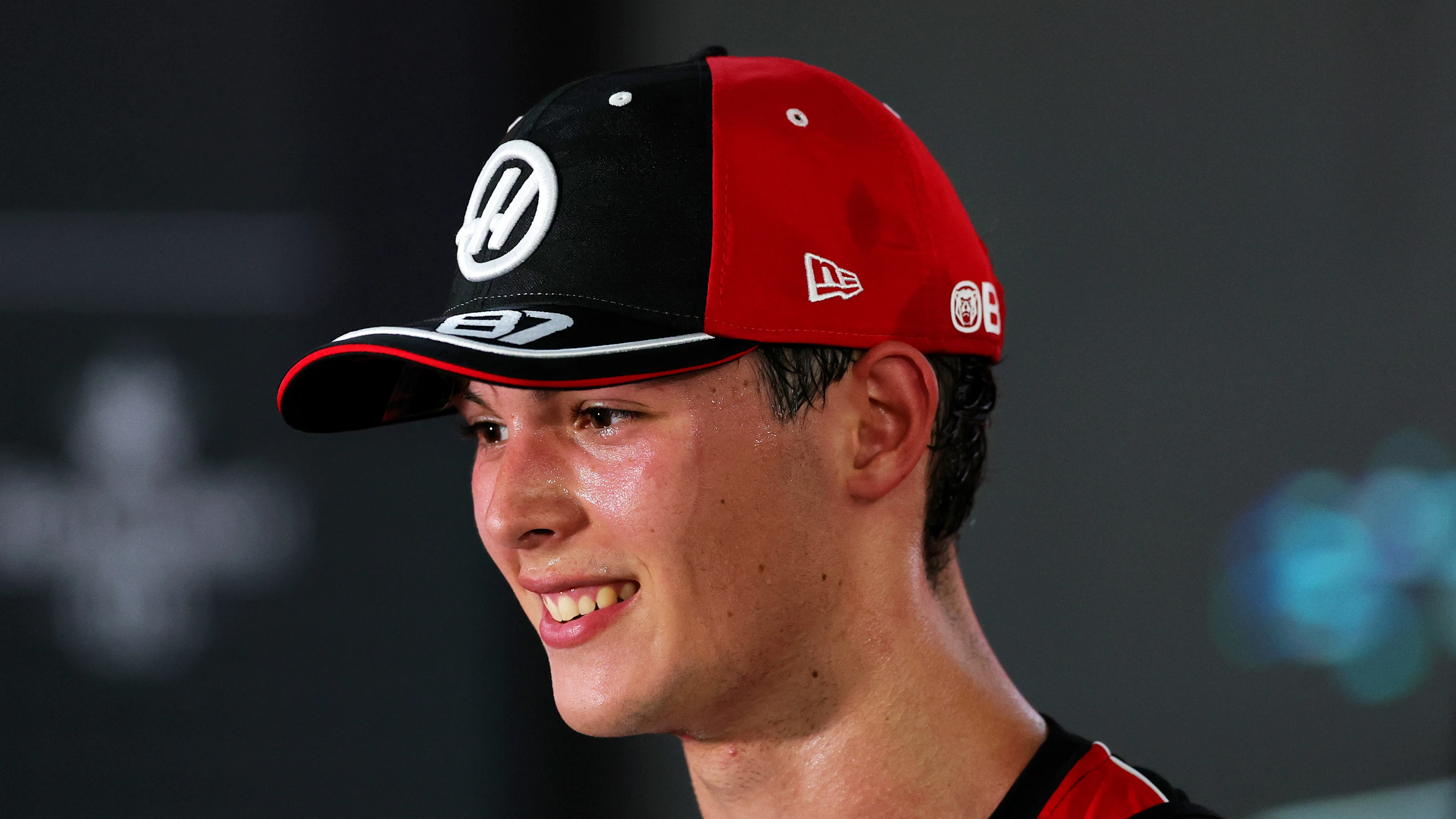 SINGAPORE, SINGAPORE - OCTOBER 04: Ninth placed qualifier Oliver Bearman of Great Britain and Haas F1 looks on during qualifying ahead of the F1 Grand Prix of Singapore at Marina Bay Street Circuit on October 04, 2025 in Singapore, Singapore. (Photo by Bryn Lennon/Getty Images)
