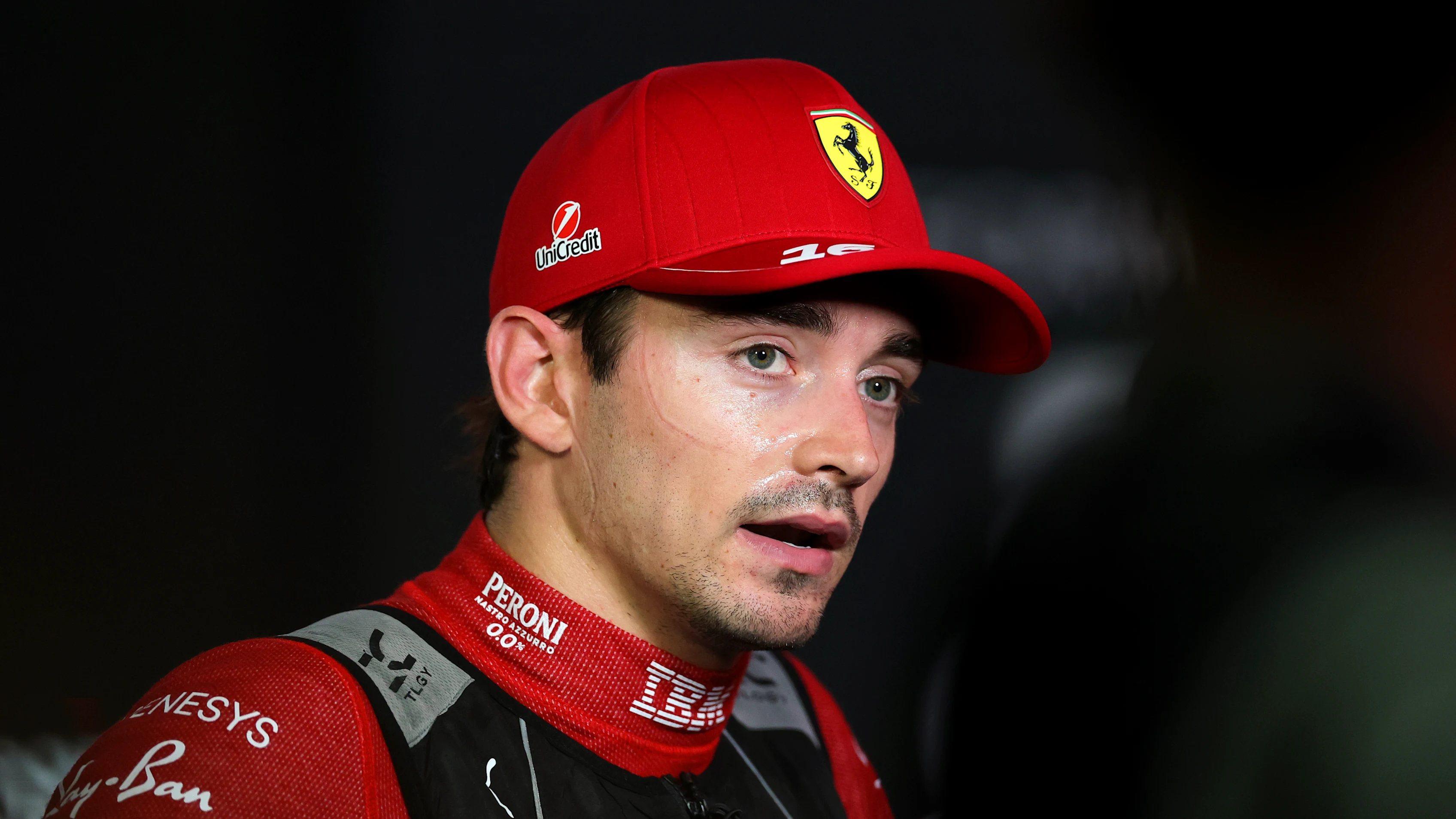SINGAPORE, SINGAPORE - OCTOBER 04: Seventh placed qualifier Charles Leclerc of Monaco and Scuderia