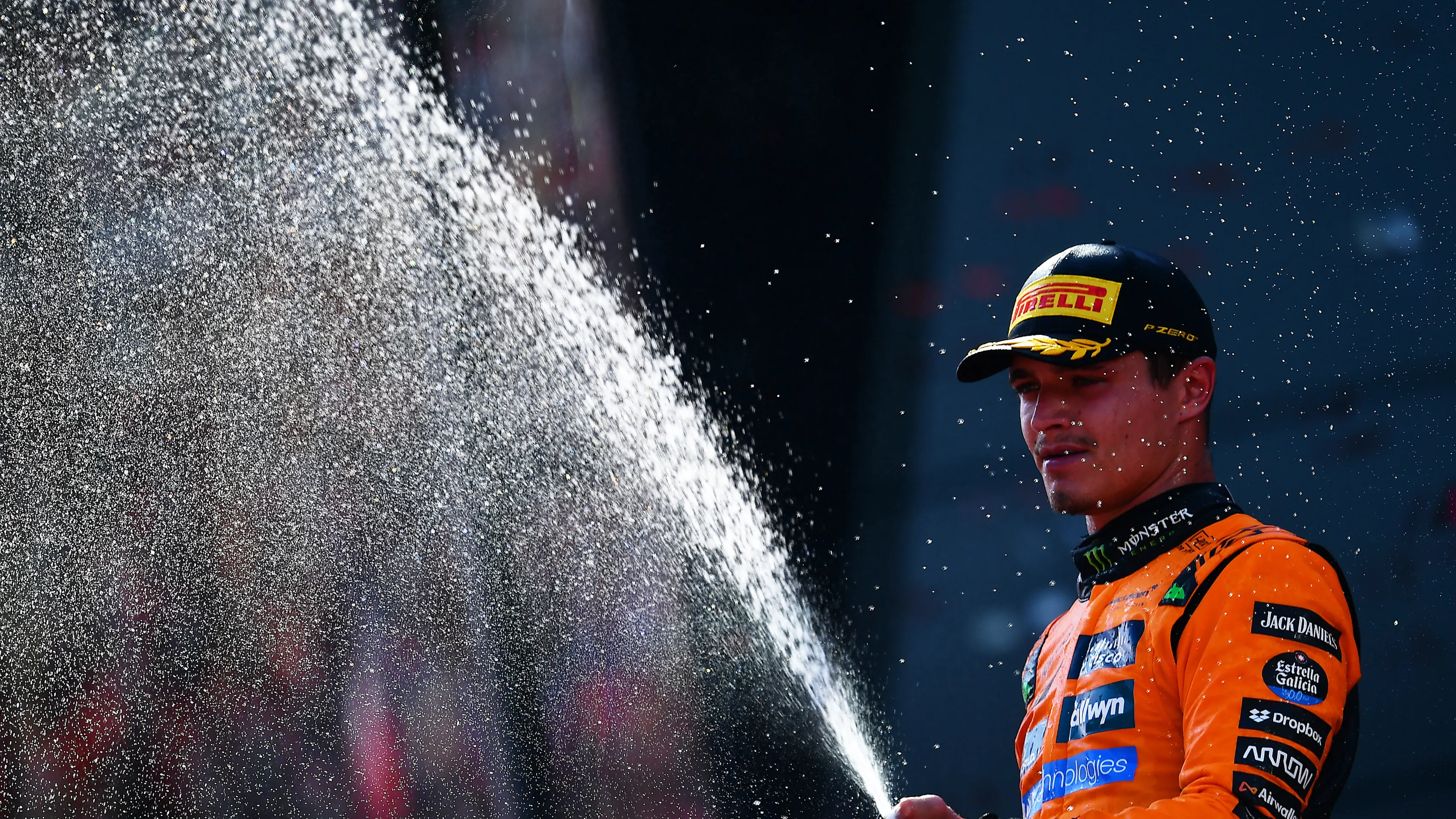 SPIELBERG, AUSTRIA - JUNE 29: Race winner Lando Norris of Great Britain and McLaren sprays