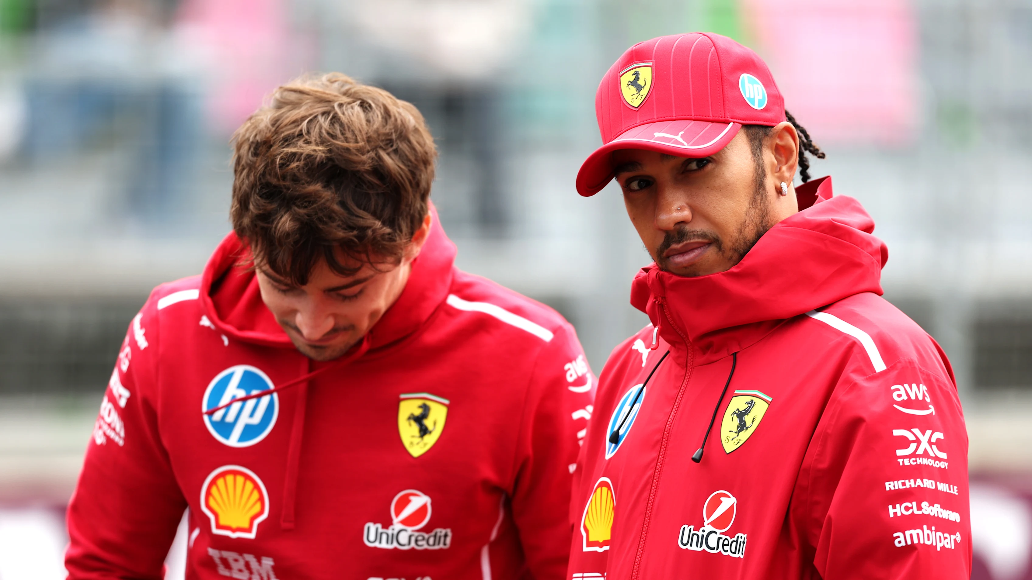 BAKU, AZERBAIJAN - SEPTEMBER 21: Charles Leclerc of Monaco and Scuderia Ferrari and Lewis Hamilton