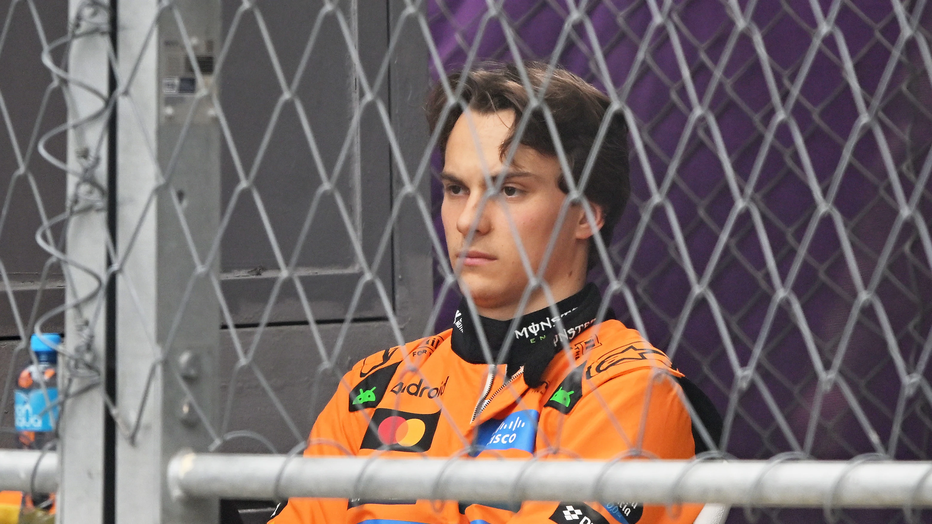 BAKU, AZERBAIJAN - SEPTEMBER 21: Oscar Piastri of Australia and McLaren looks on after crashing out