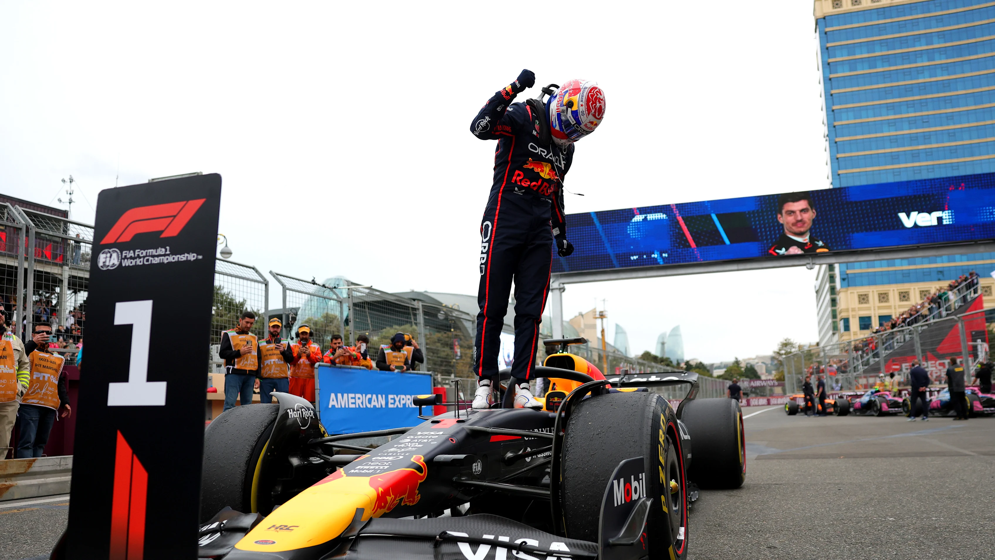 BAKU, AZERBAIJAN - SEPTEMBER 21: Race winner Max Verstappen of the Netherlands and Oracle Red Bull Racing celebrates on arrival in parc ferme during the F1 Grand Prix of Azerbaijan at Baku City Circuit on September 21, 2025 in Baku, Azerbaijan. (Photo by Bryn Lennon - Formula 1/Formula 1 via Getty Images)