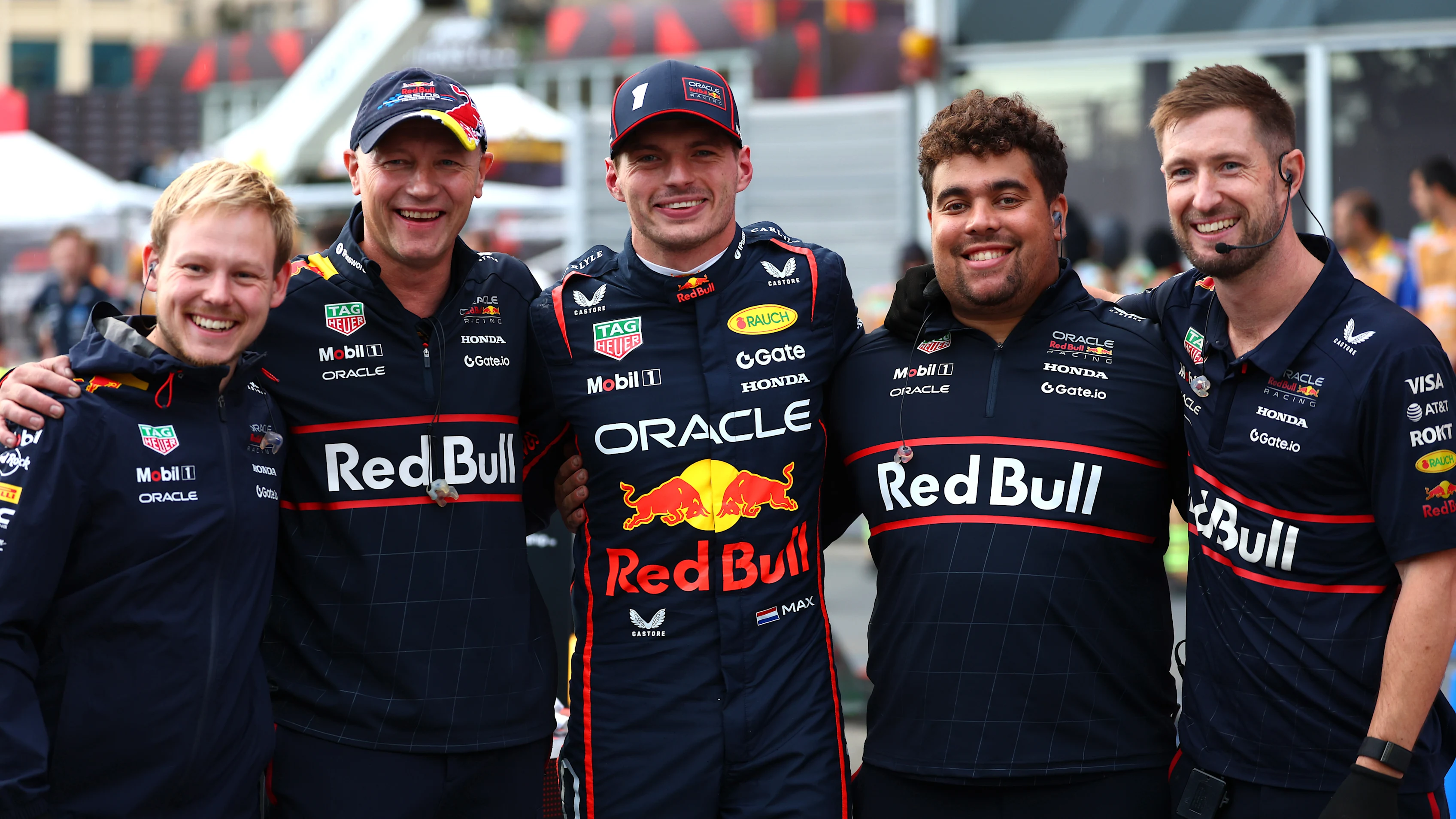 BAKU, AZERBAIJAN - SEPTEMBER 20: Pole position qualifier Max Verstappen of the Netherlands and Oracle Red Bull Racing celebrates in parc ferme with his team during qualifying ahead of the F1 Grand Prix of Azerbaijan at Baku City Circuit on September 20, 2025 in Baku, Azerbaijan. (Photo by Mark Thompson/Getty Images)