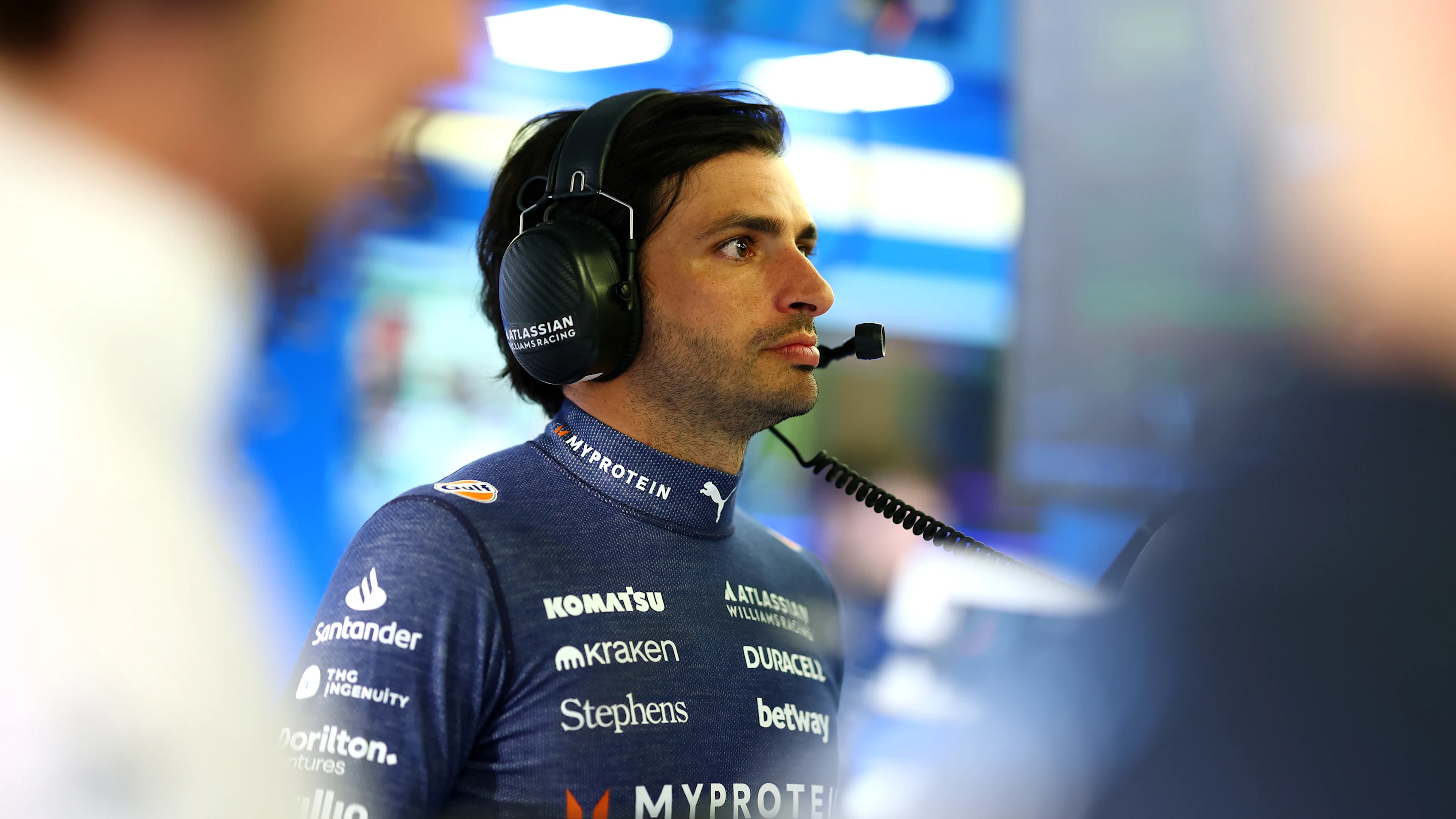 BAHRAIN, BAHRAIN - APRIL 11: Carlos Sainz of Spain and Williams looks on in the garage during