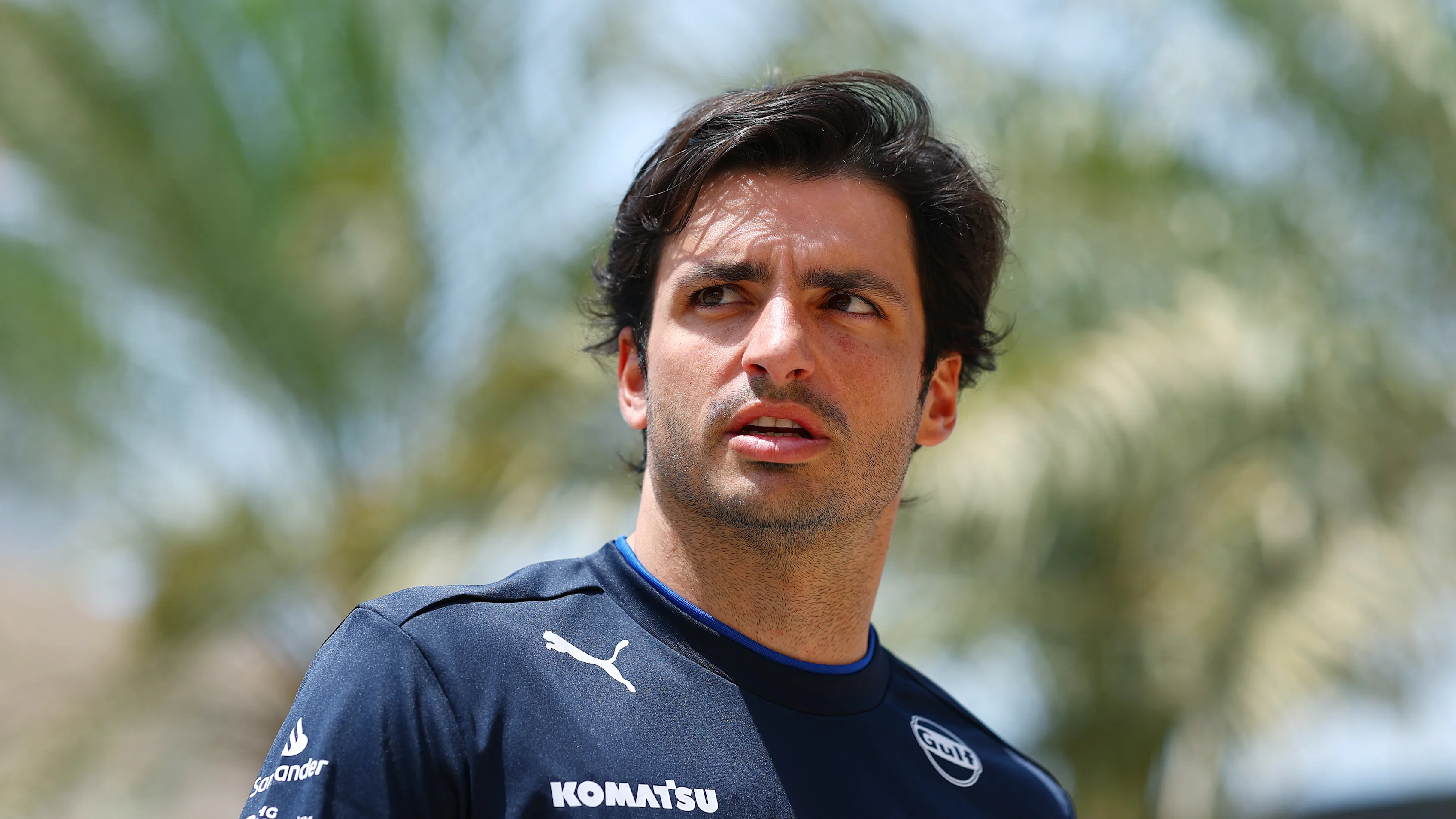 BAHRAIN, BAHRAIN - APRIL 10: Carlos Sainz of Spain and Williams looks on in the Paddock during
