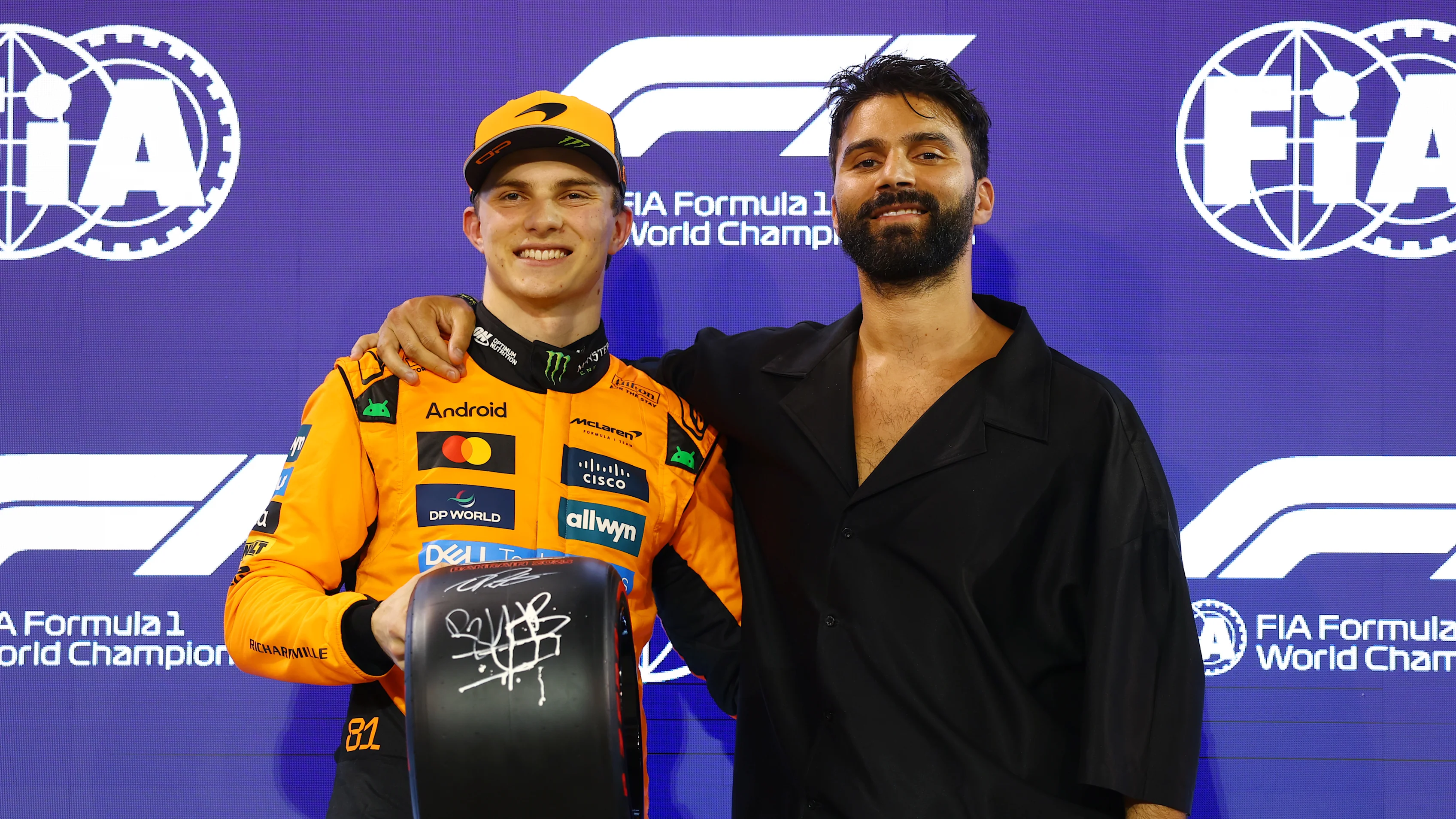 BAHRAIN, BAHRAIN - APRIL 12: Pole position qualifier Oscar Piastri of Australia and McLaren