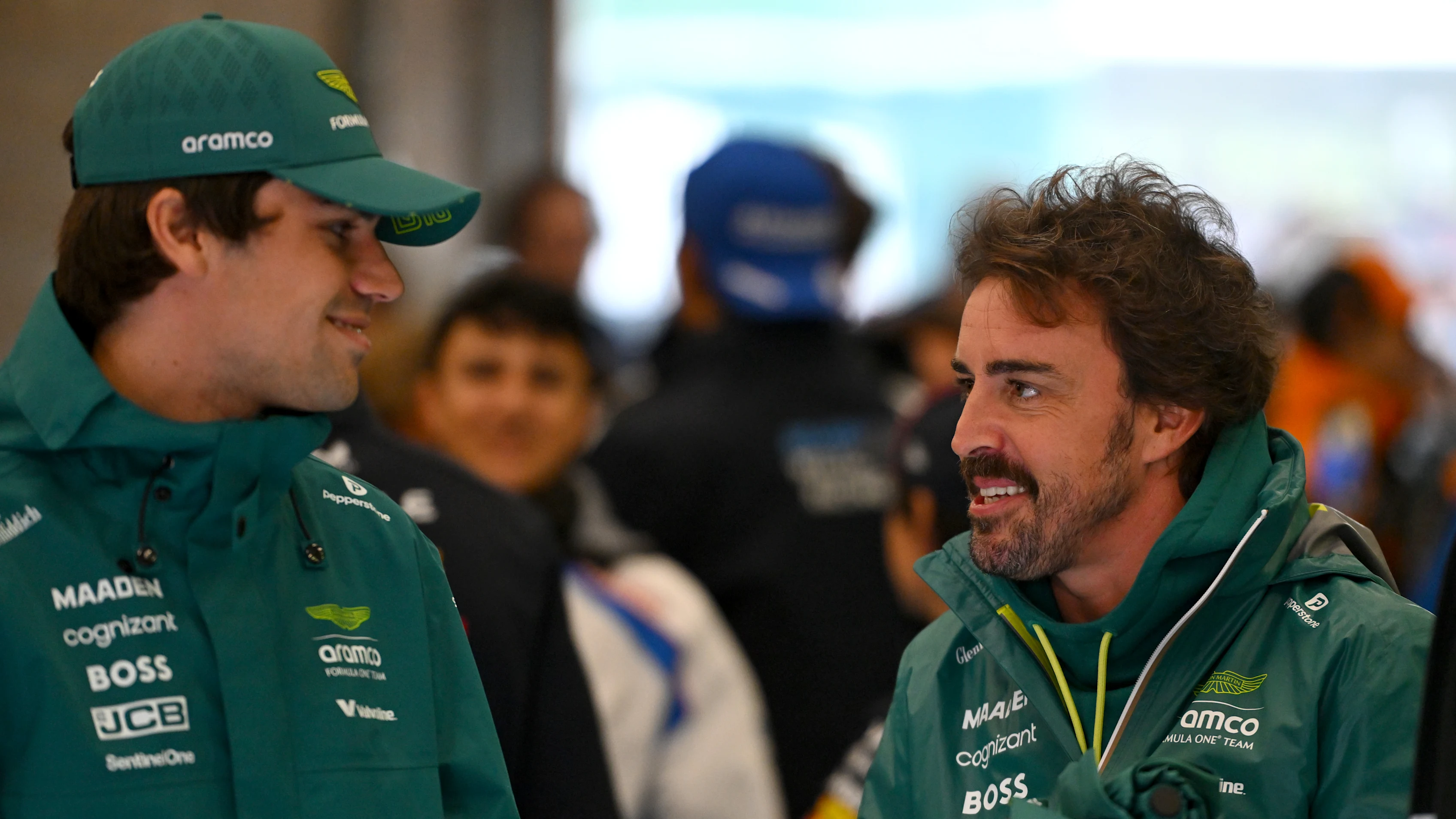 SPA, BELGIUM - JULY 27: Lance Stroll of Canada and Aston Martin F1 Team and Fernando Alonso of Spain and Aston Martin F1 Team talk on the drivers parade prior to the F1 Grand Prix of Belgium at Circuit de Spa-Francorchamps on July 27, 2025 in Spa, Belgium. (Photo by Rudy Carezzevoli/Getty Images)