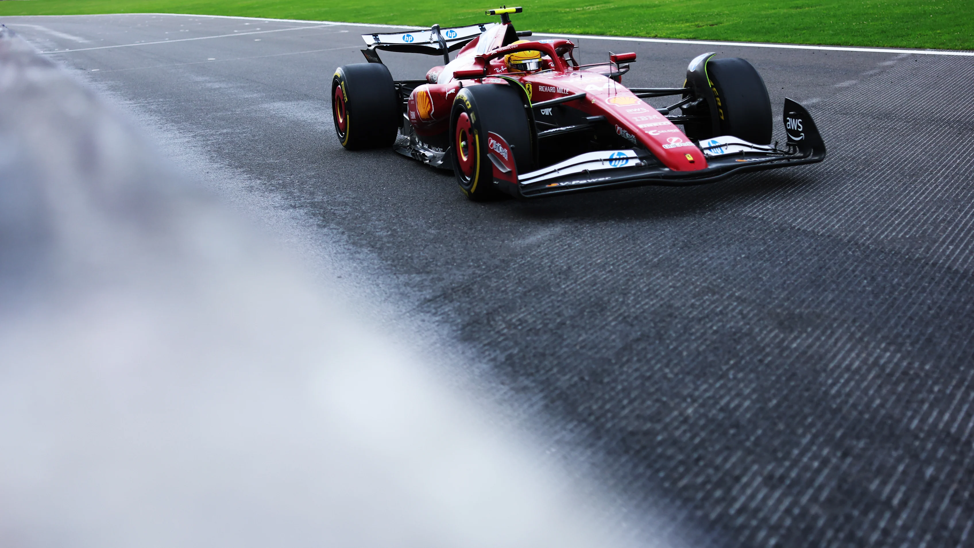 SPA, BELGIUM - JULY 27: Lewis Hamilton of Great Britain driving the (44) Scuderia Ferrari SF-25 on