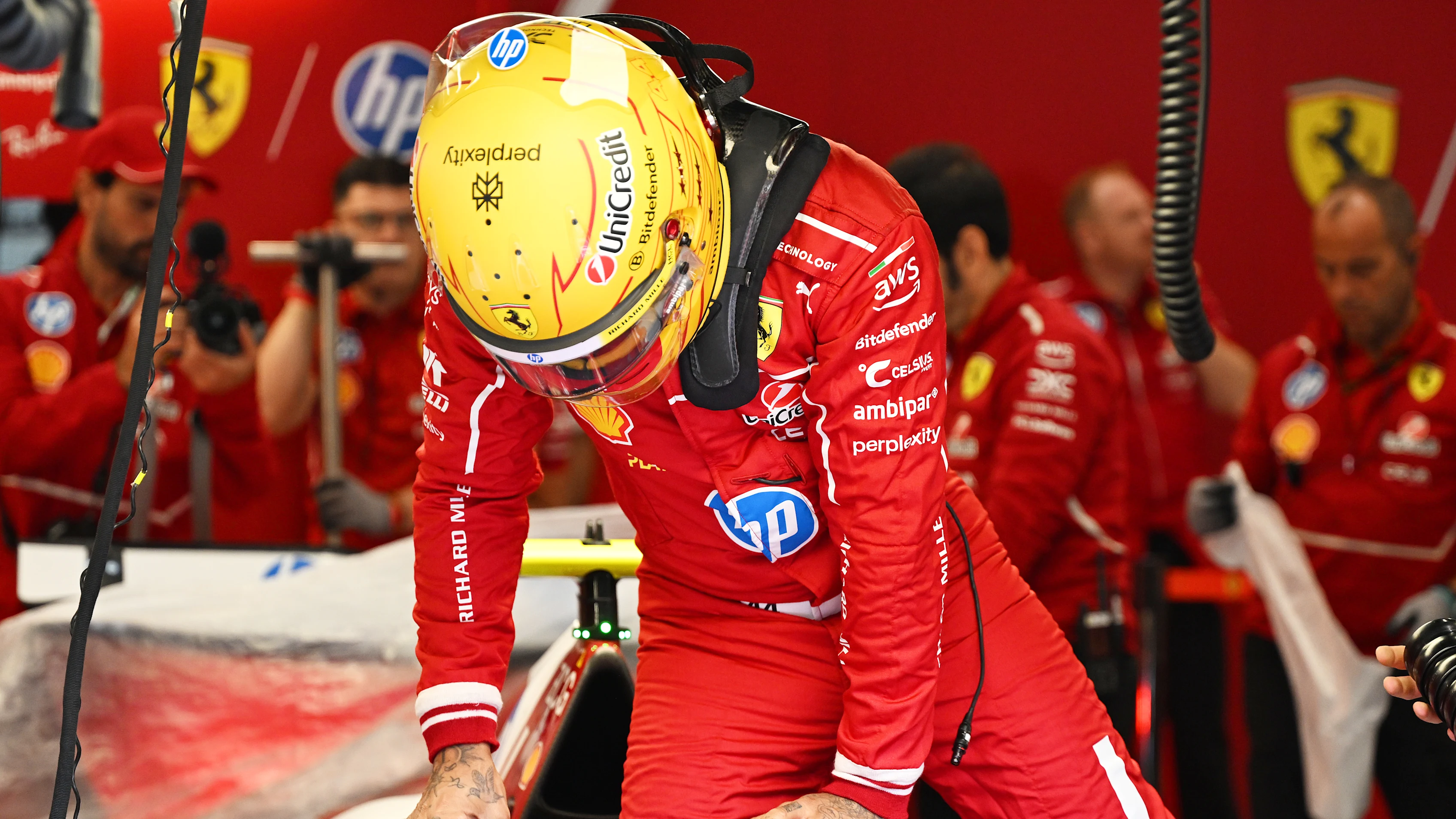 SPA, BELGIUM - JULY 25: Lewis Hamilton of Great Britain and Scuderia Ferrari prepares to drive in